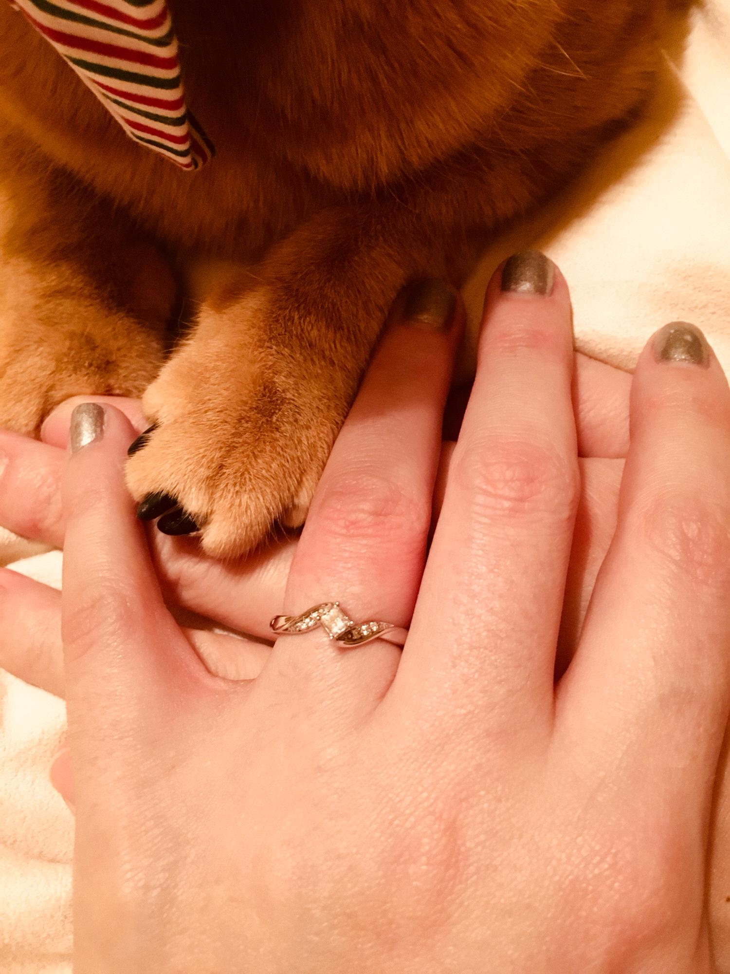 Family posing with the ring!