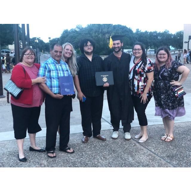 Rayda's family at graduation, a proud moment for everyone.