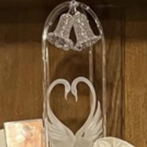 The cake topper is original to the Thomas family.