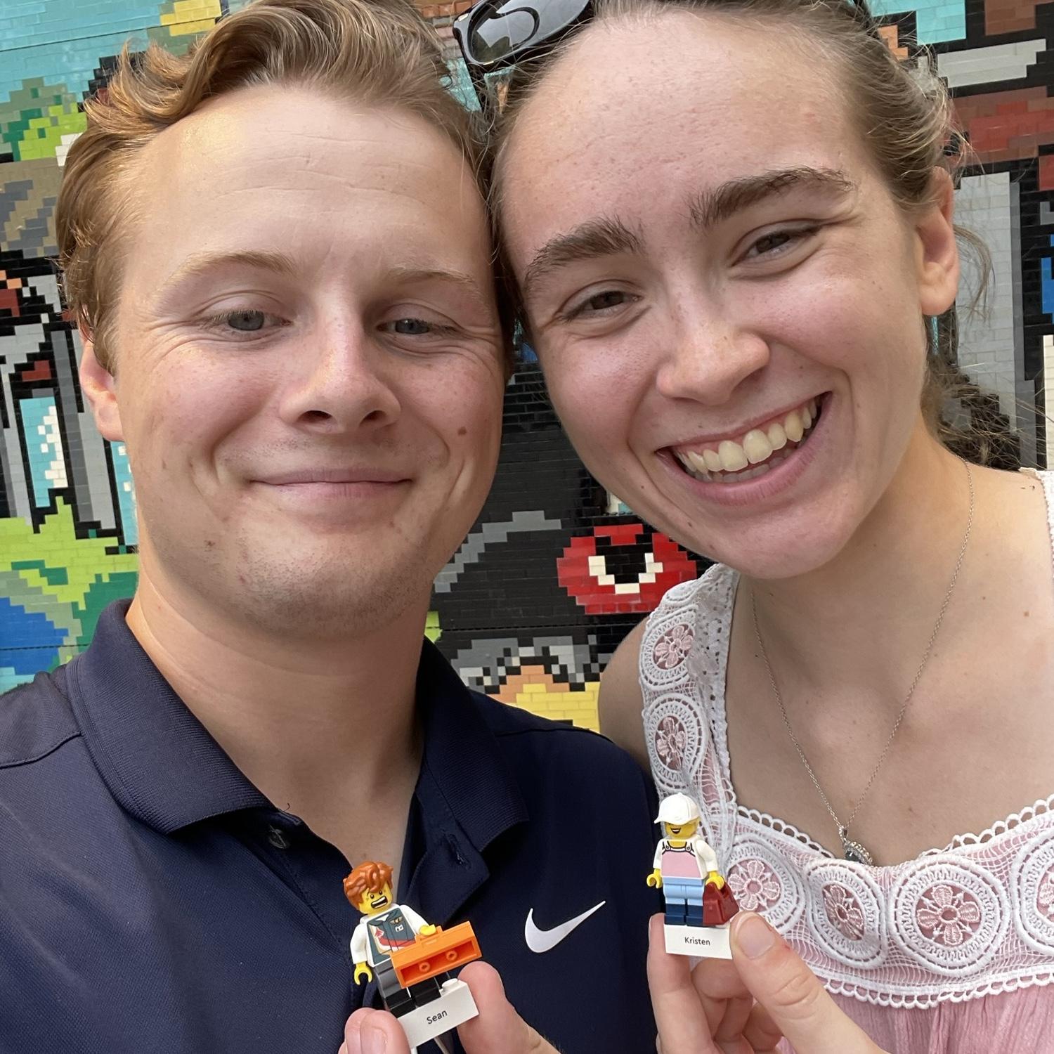 Kristen and Sean with LEGO minifigures that they designed at the LEGO store in Disney Springs.
