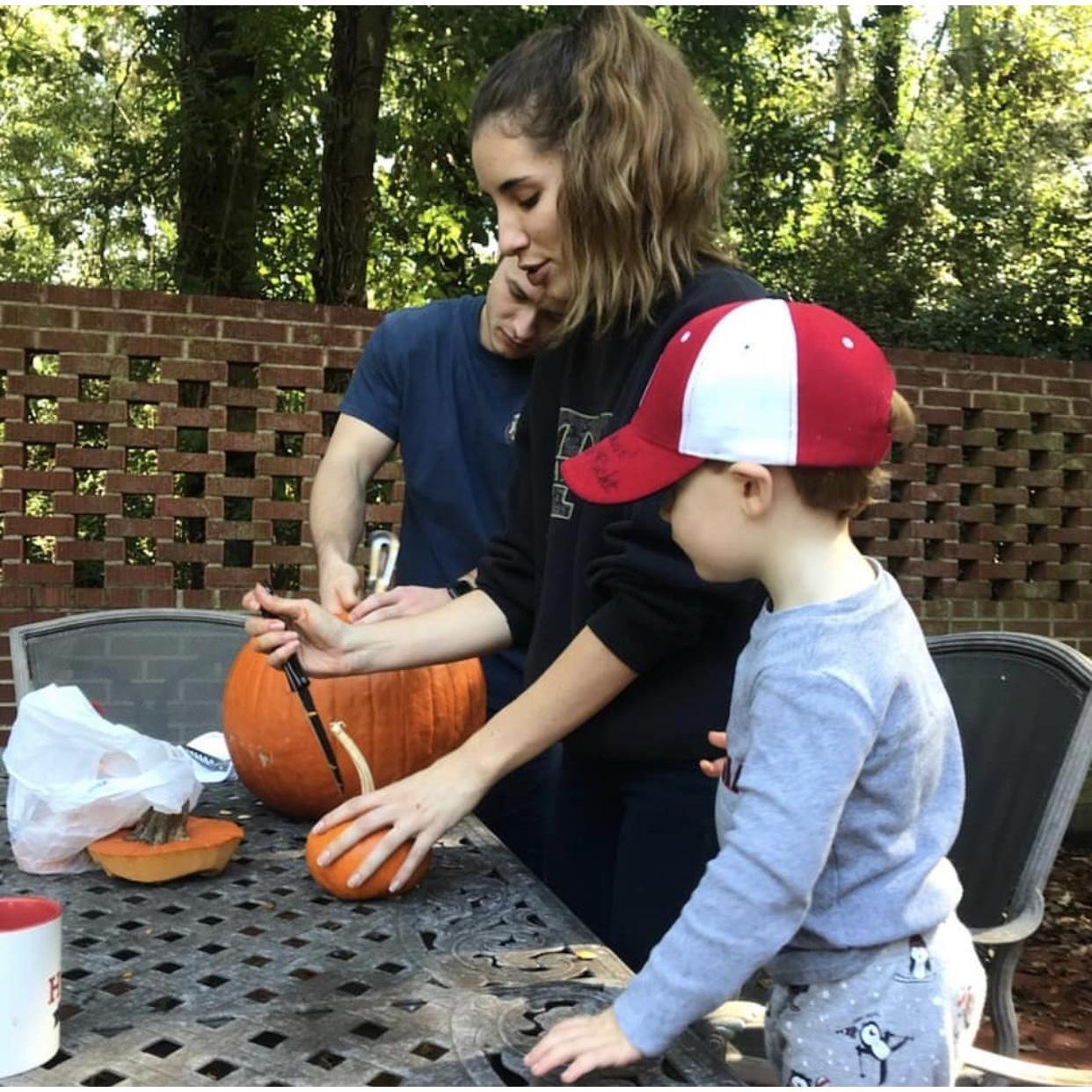 Carving pumpkins with our little ring bearer!