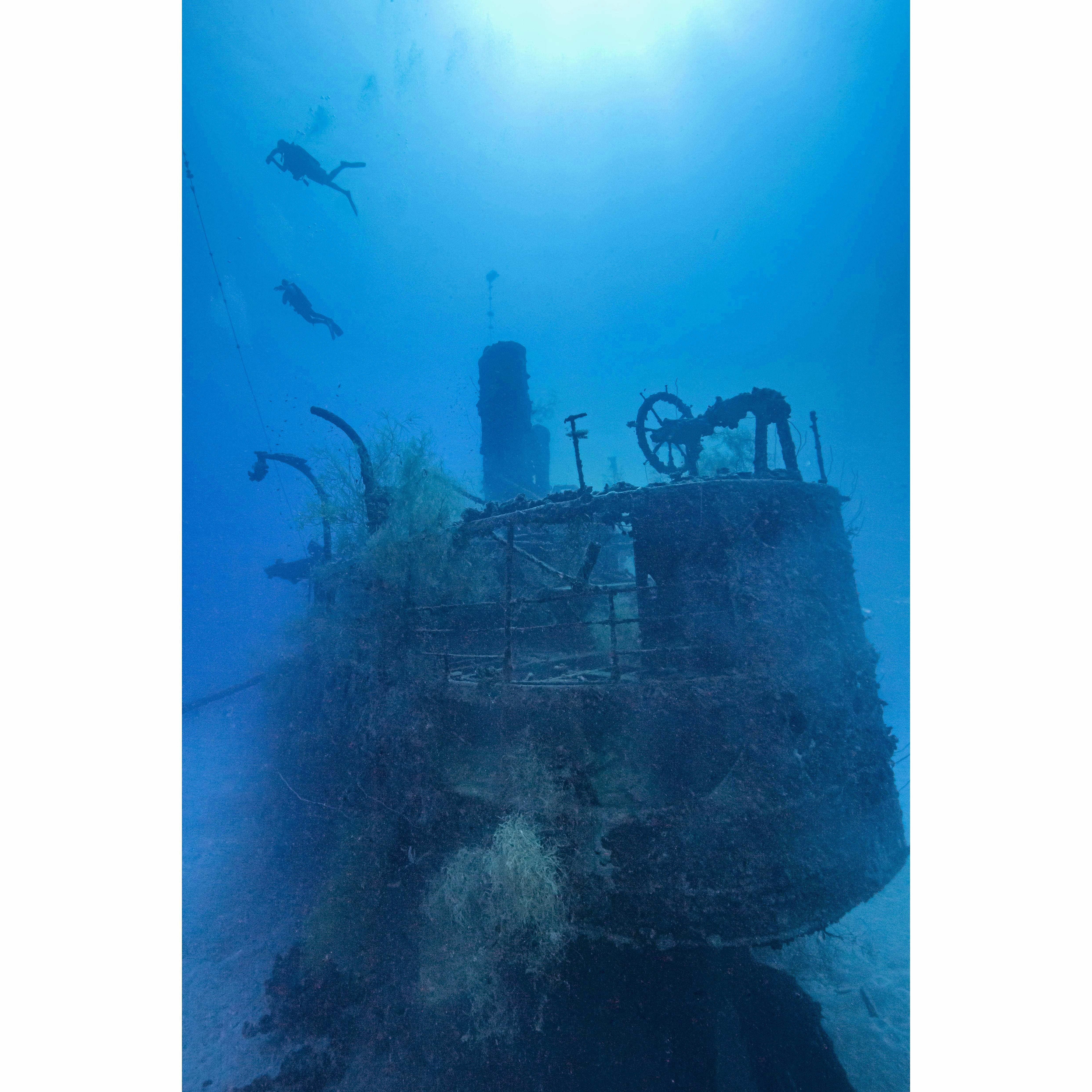 On The Palawan. Russ and Aida pictured here diving a Japanese WWII shipwreck resting at 120ft underwater during their April 2023 research trip. The couple that expeditions together stays together.