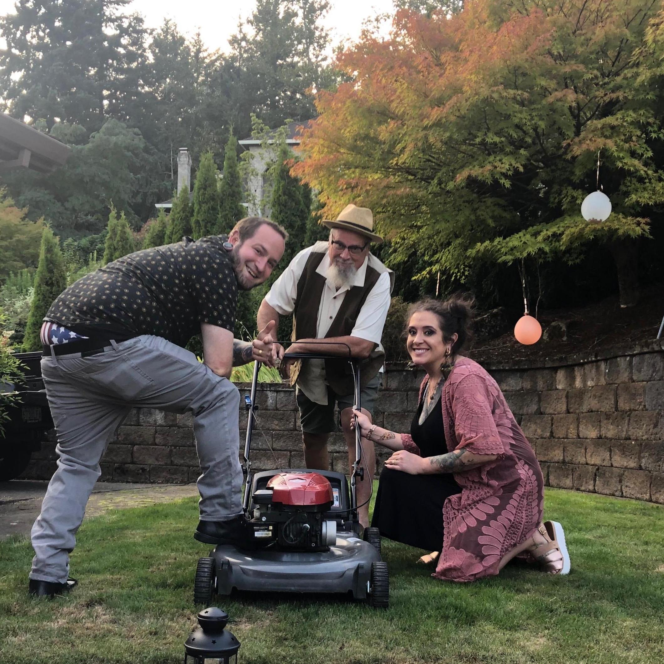 At our engagement party with the mandatory picture with Halls lawn mower 2019