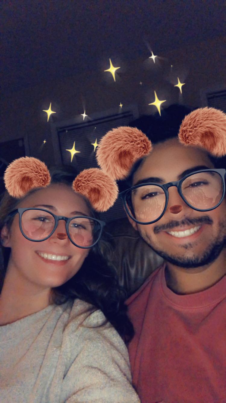 Esteban and Mallory being goofy with Snapchat filters