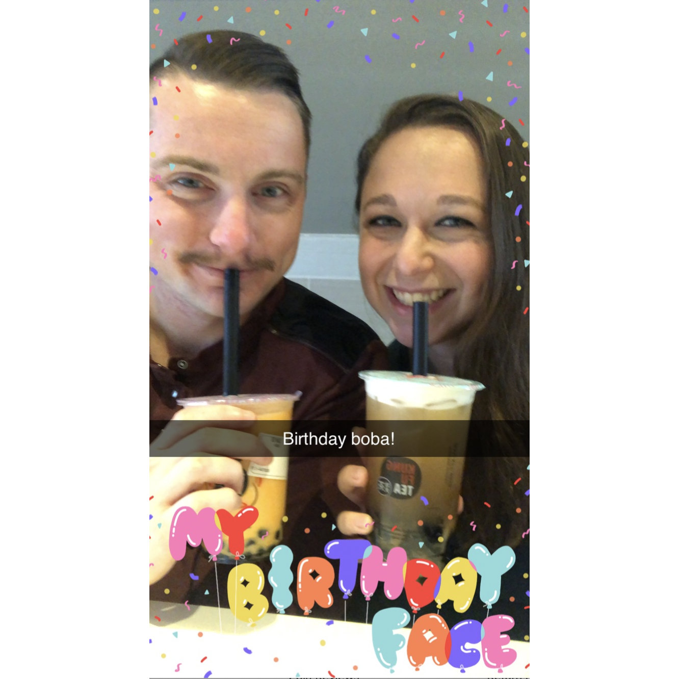 Celebrating Sharie's birthday with Boba. Although Sharie is not too happy about the mustache on my face!