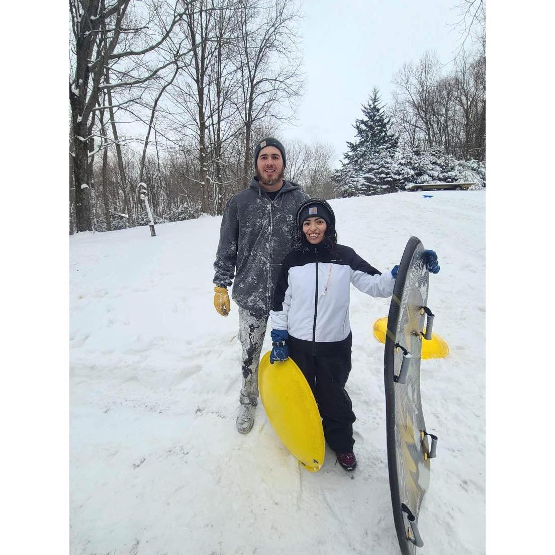 Sledding at grandma Judy's on Christmas.