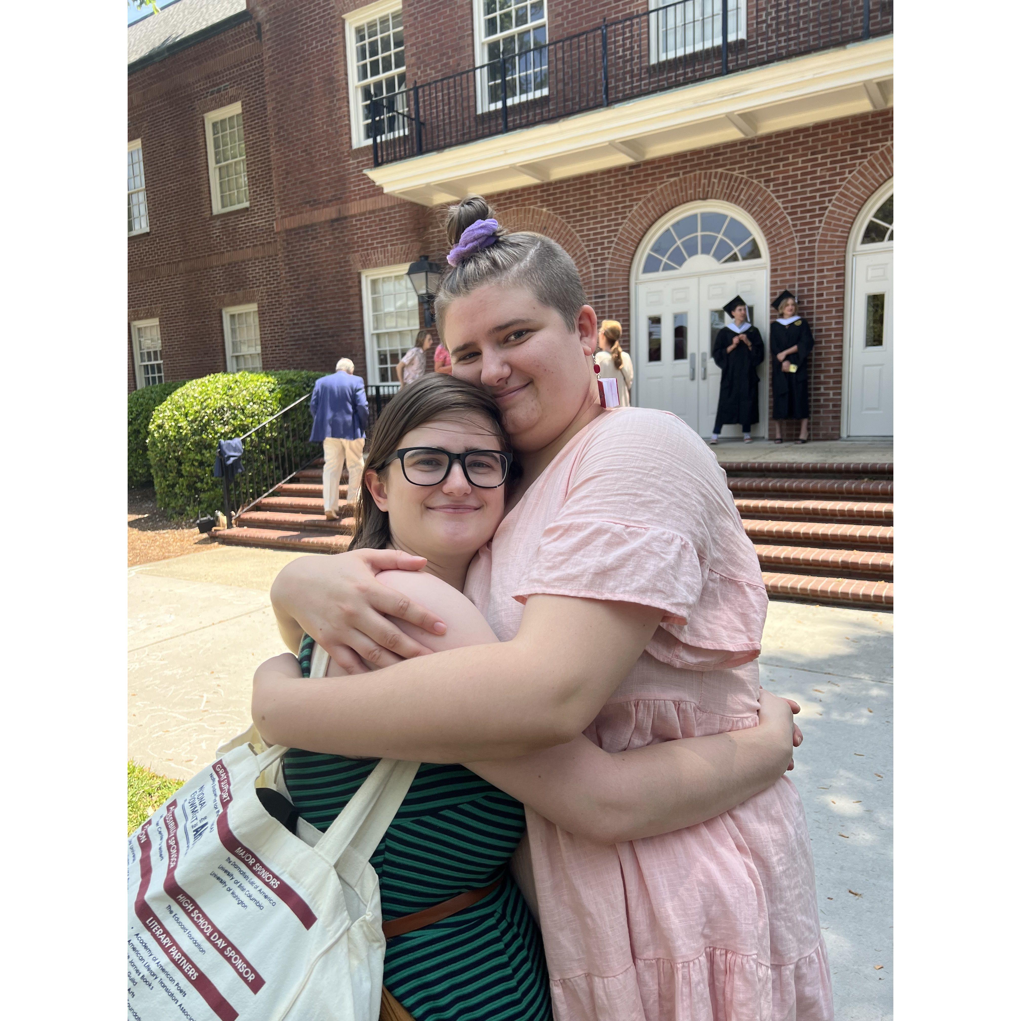 At Luca's graduation from their MFA in Creative Writing at UNCW