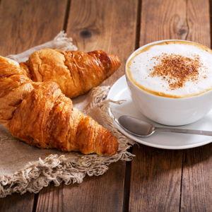 A cappuccino and croissant morning