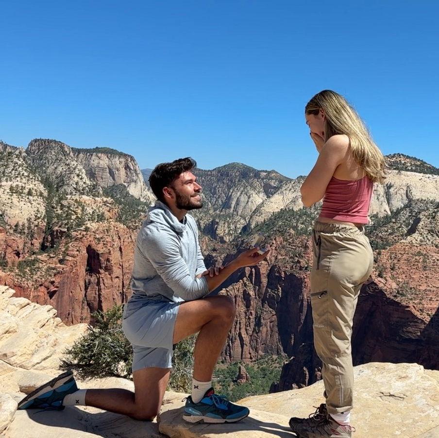 May 2025: Tyler's proposal at the top of Angels Landing.