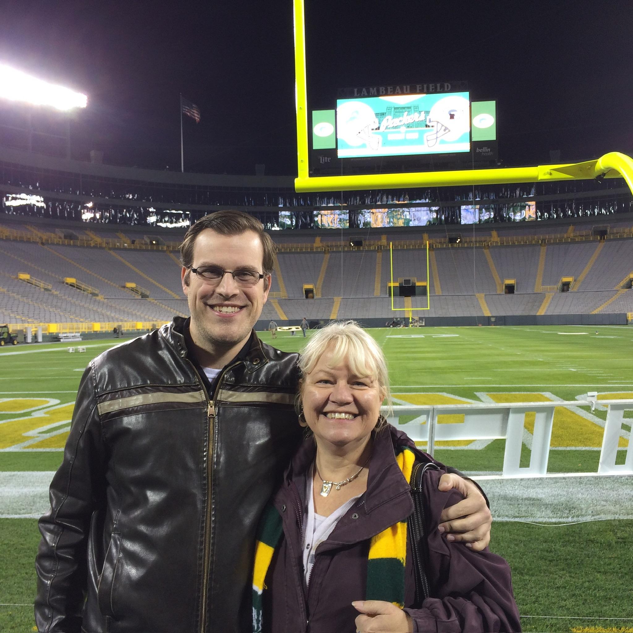 Chris and his mom at Lambo field