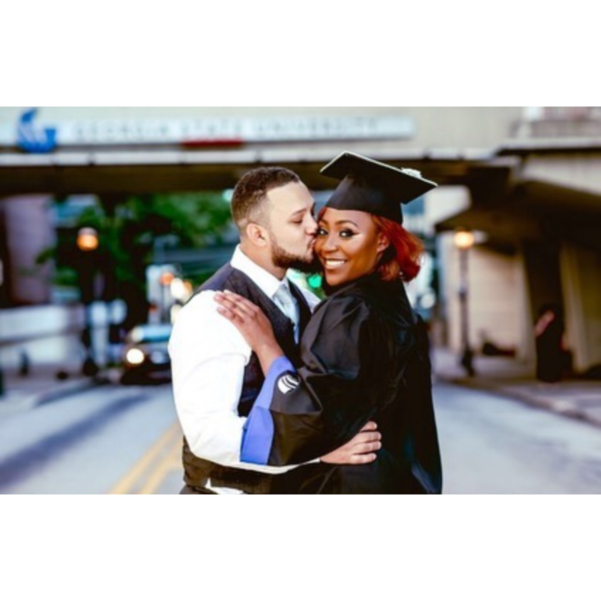 Graduation shoot with the love of my life. He was very integral to my success.