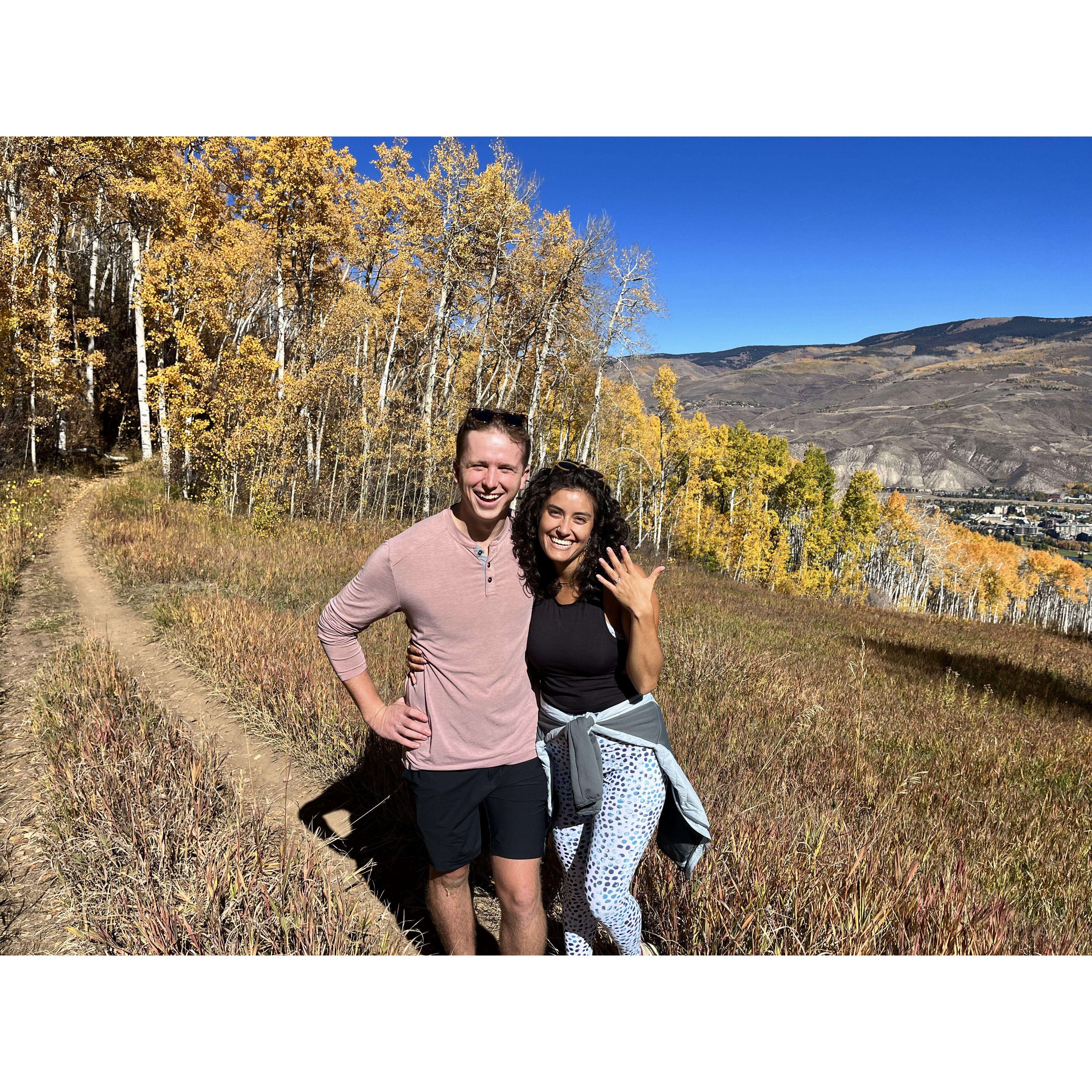 The moment Willy proposed on a hike during a gorgeous fall day in Colorado