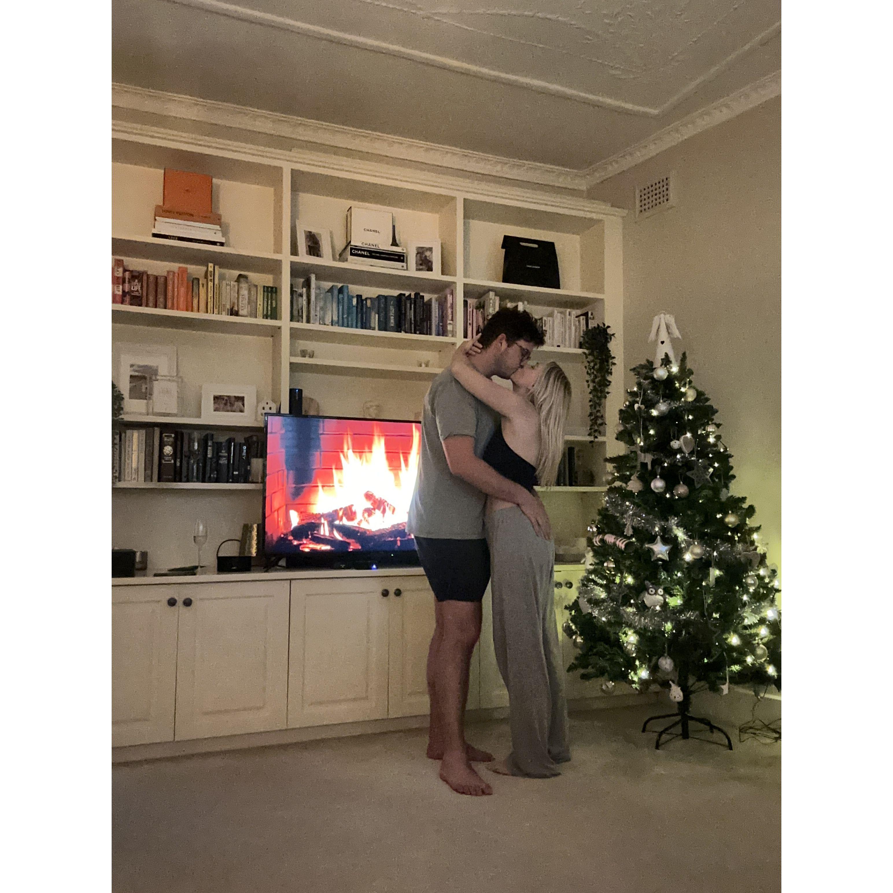 First Christmas in Our apartment. We love the moody fire on YouTube for our date nights