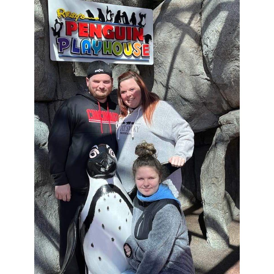 Our little family at the penguin exhibit in the Ripley's Aquarium.