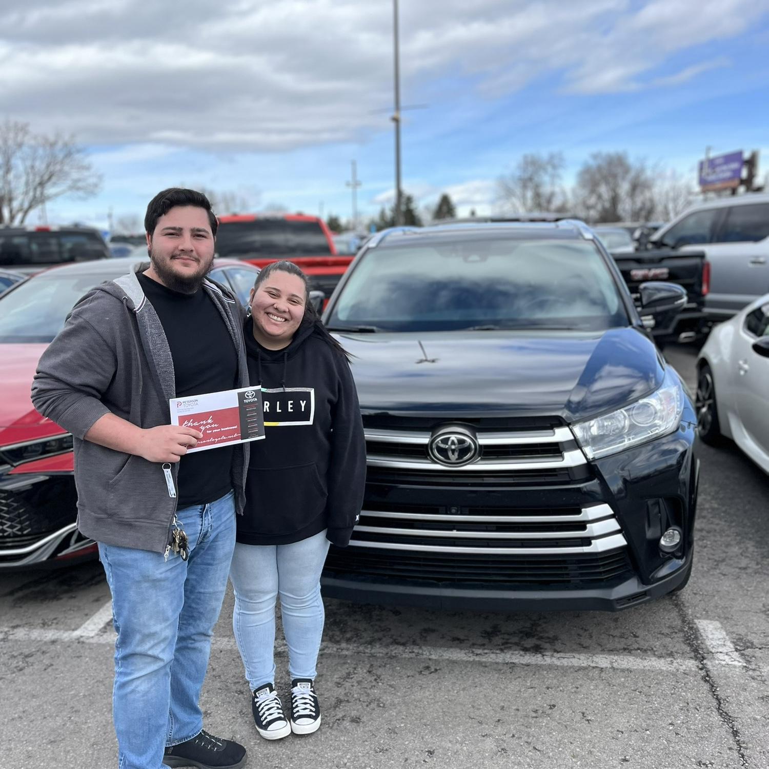 A picture from when Jaden bought Alexus a new car.