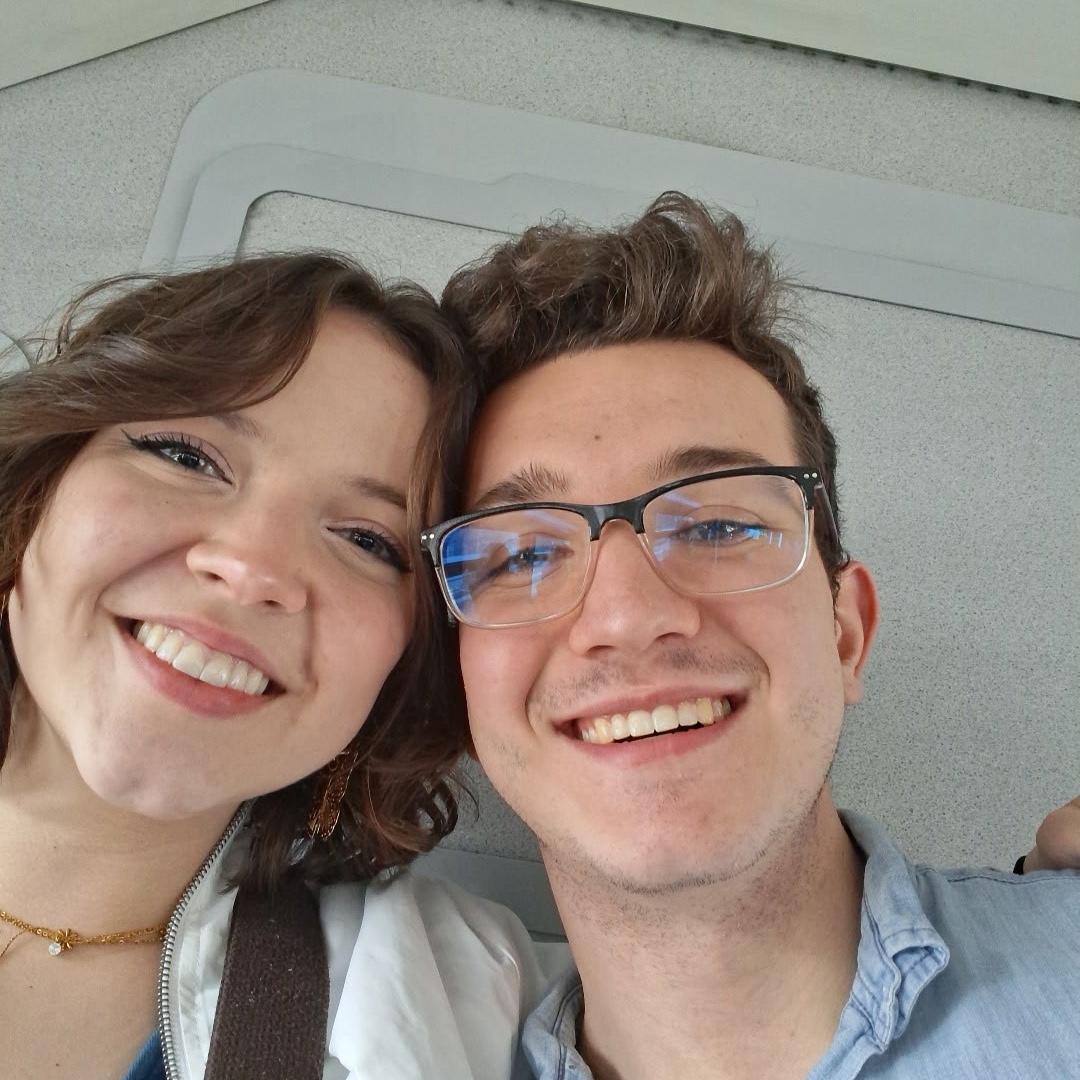 February 2025 Emma and Caleb on public transport (a common sight)