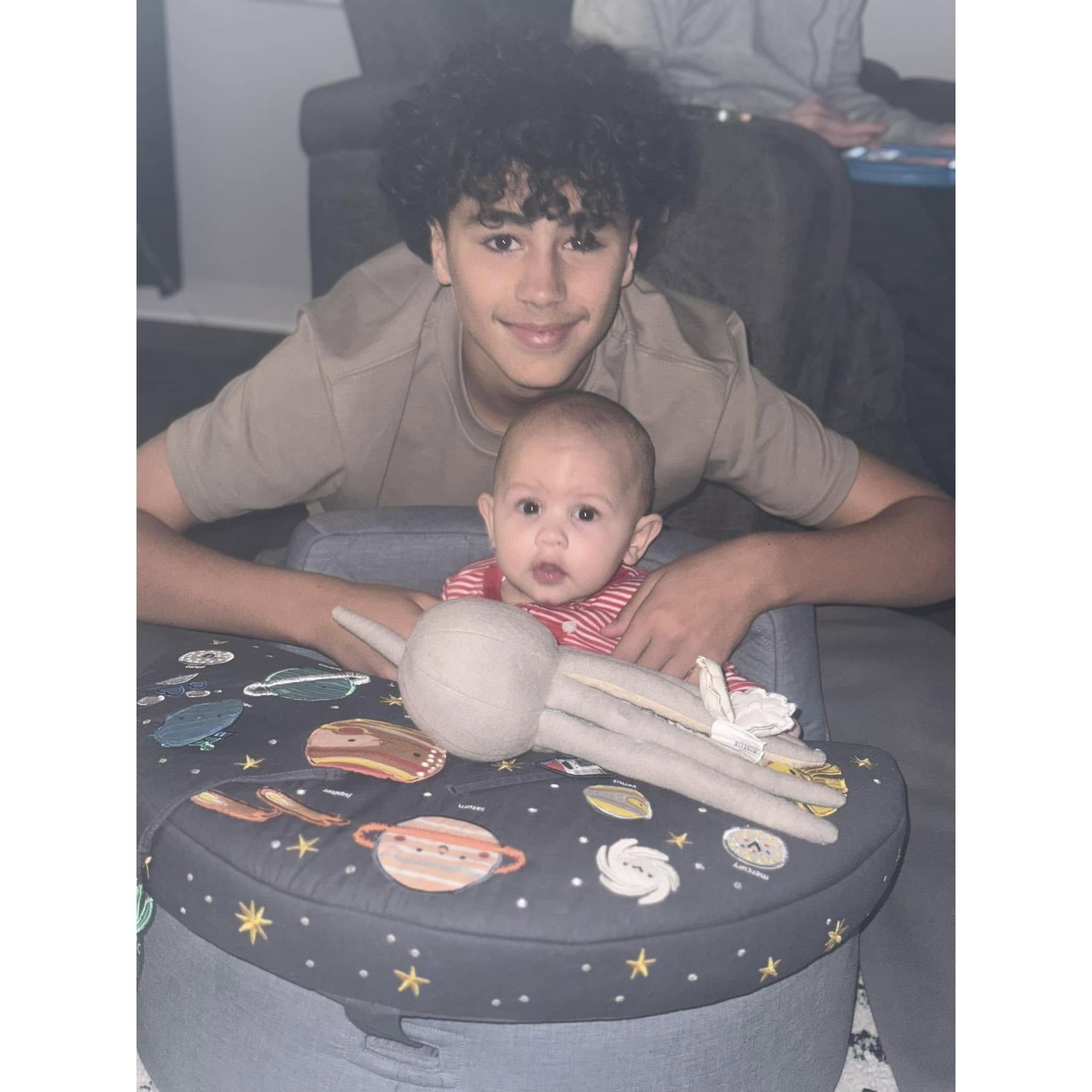 Grandsons enjoying eachother!! Teddy enjoying his oldest brother Zion!  Teddy is the newest addition to the Bloxam family!!! WE Love you both!!!