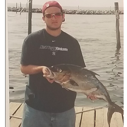 The Groom's other hobby? Fishing! This picture was taken when he was about 18.