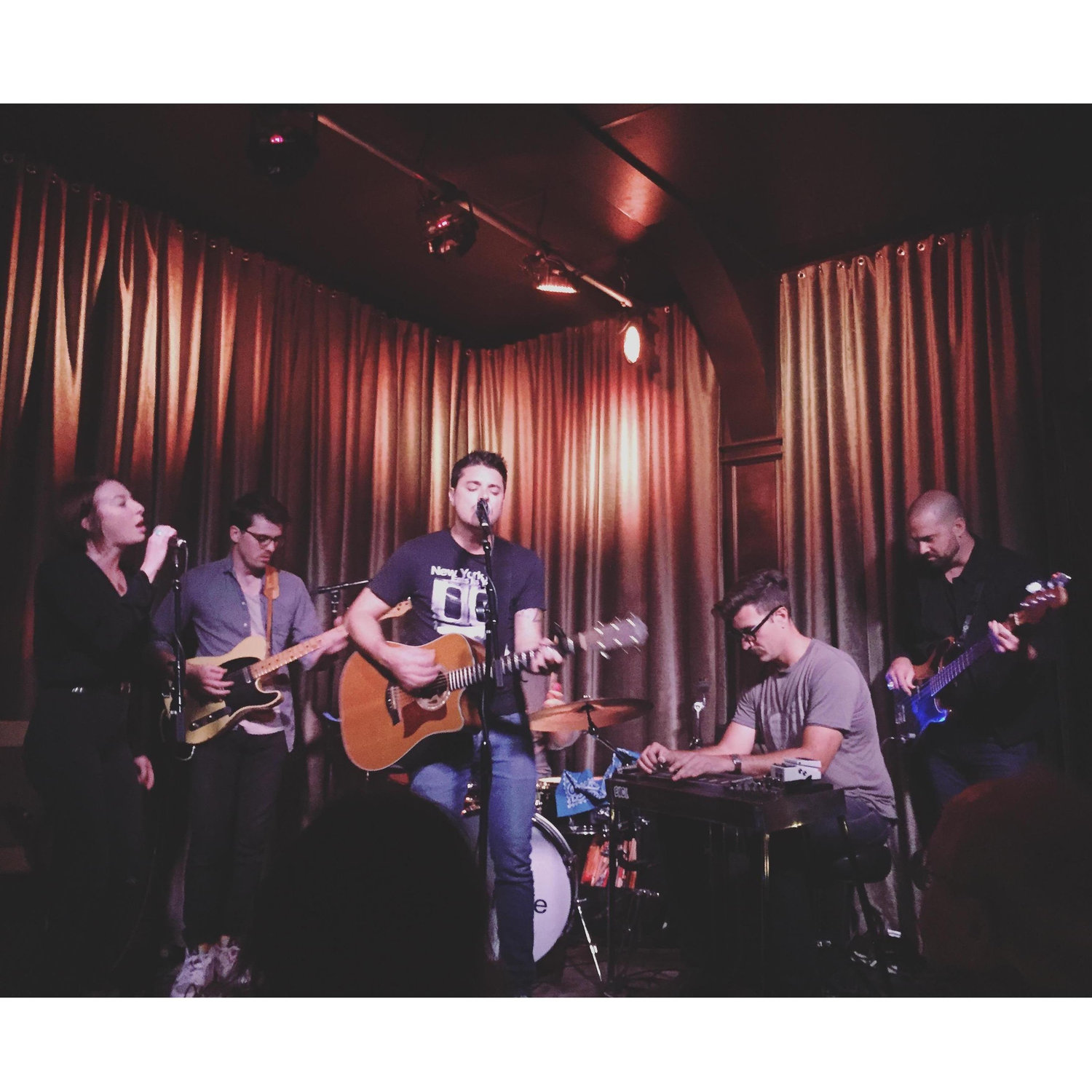 Singing together at the Hotel Cafe