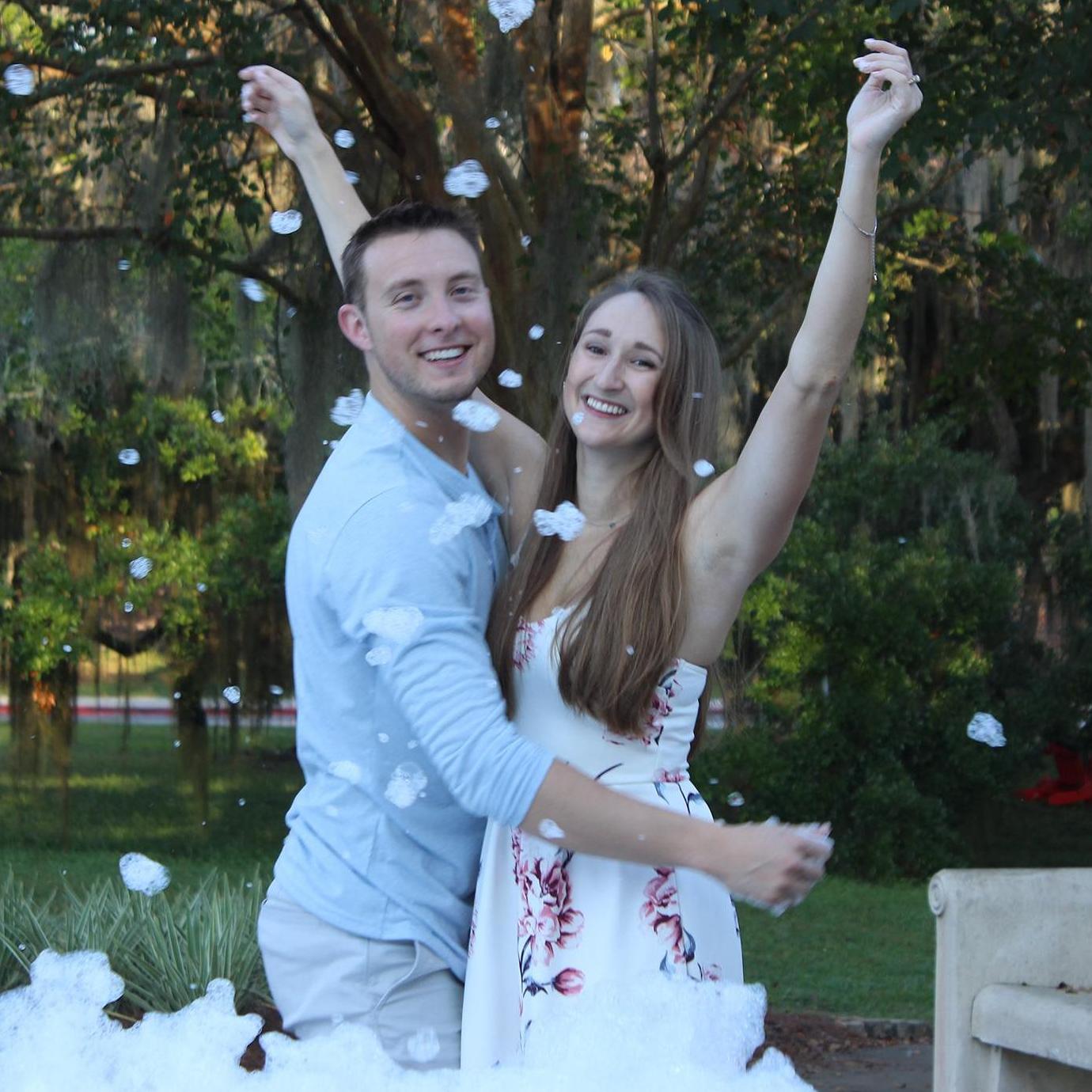 Went to Landis Green for engagement pictures and found that someone had put a bath bomb in it! We had a bubble fight.