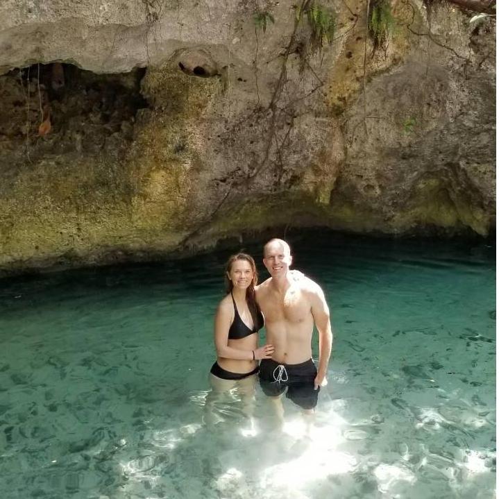 Swimming in a cenote in Tulum, Mexico