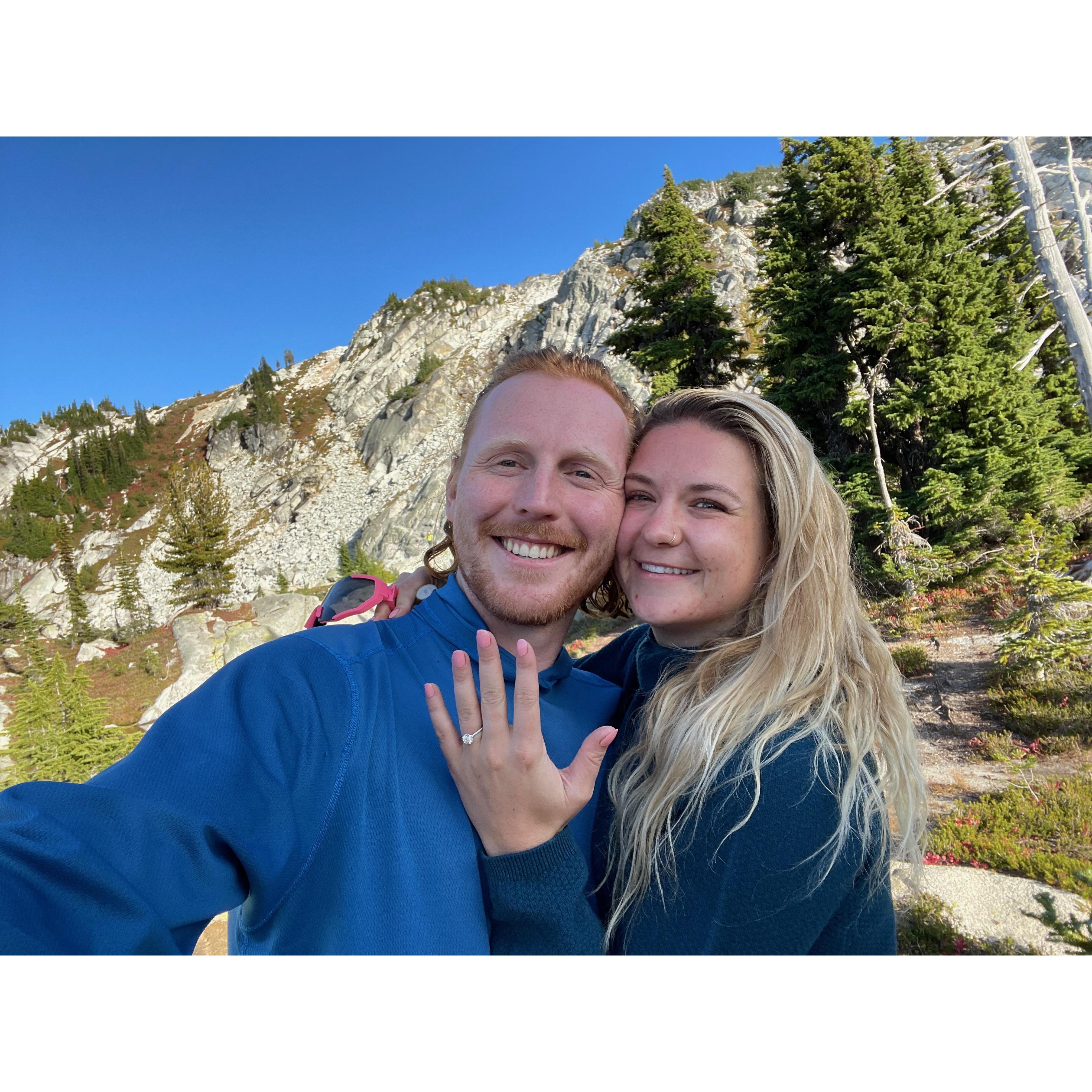 The easiest yes! Engaged at the top of Trico Peak followed by a dip in a glacial lake, a game of cribbage, and a toast to our future watching the sunset over the mountains.