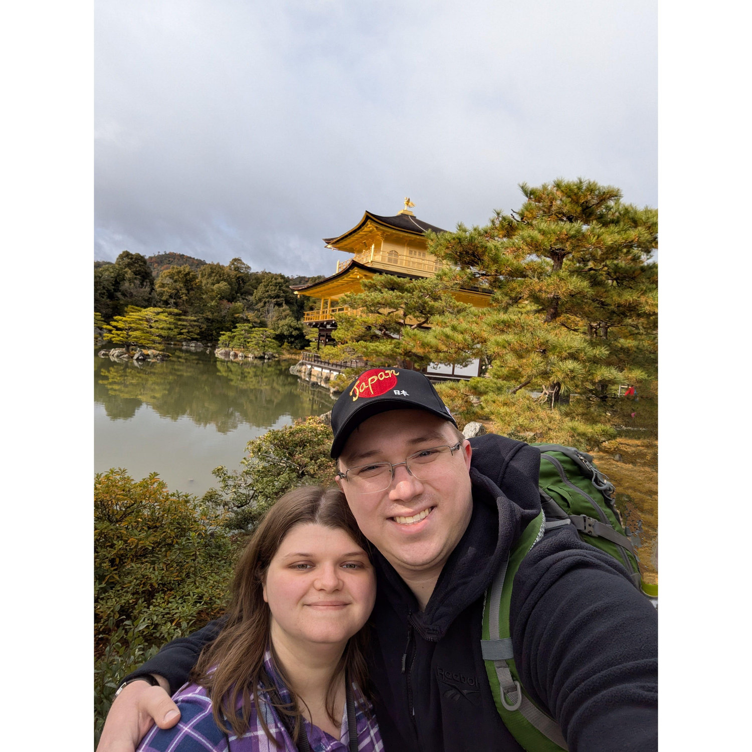 A picture in from of the Kinkatsuji Temple (Golden Temple) in Kyoto, Japan during the Japan trip we took in December 2024.
