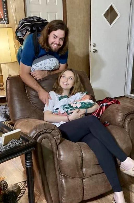 Just a really cute picture of a very happy family
