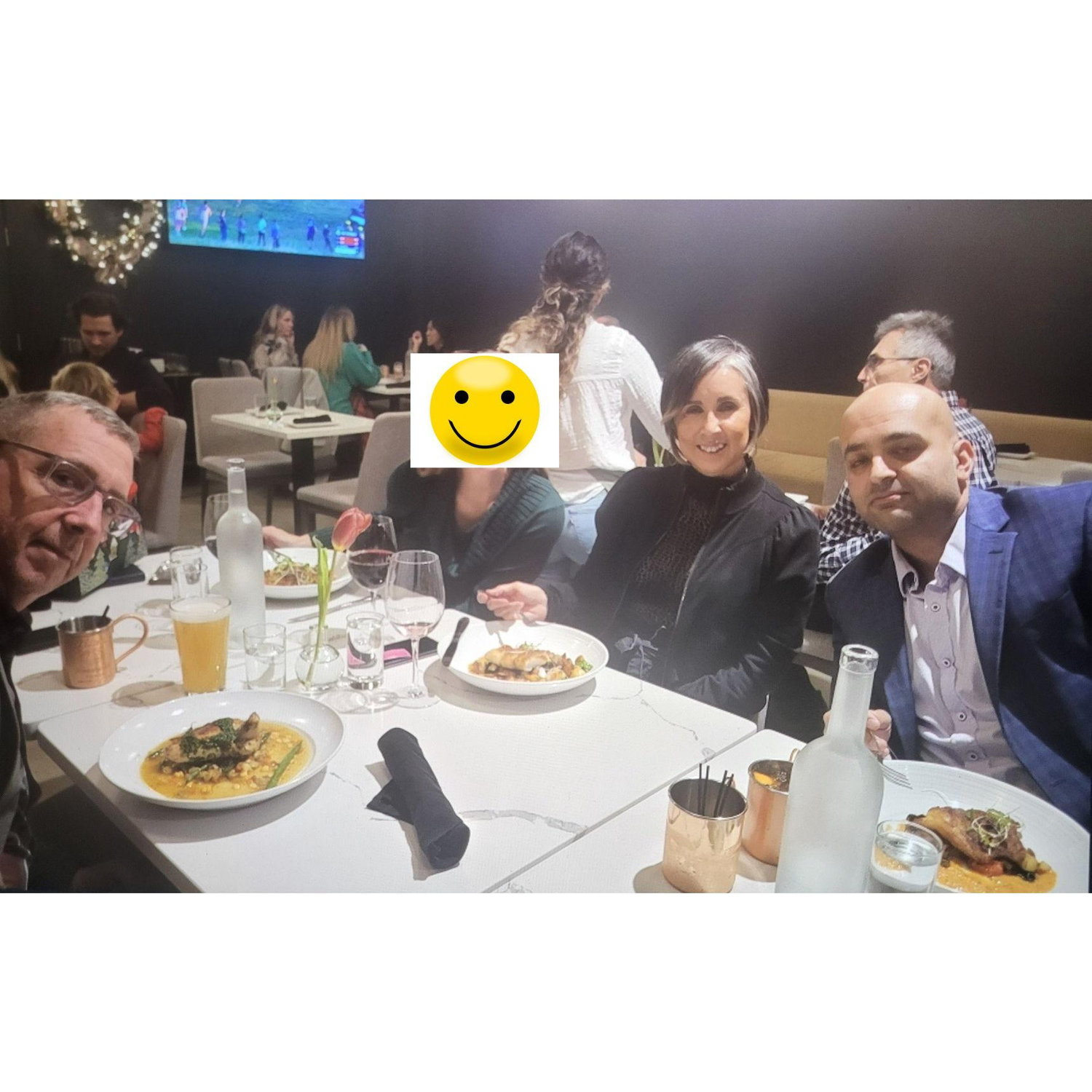One of the few pictures of us having dinner while still in "friends" status. This was the first Christmas we celebrated together.