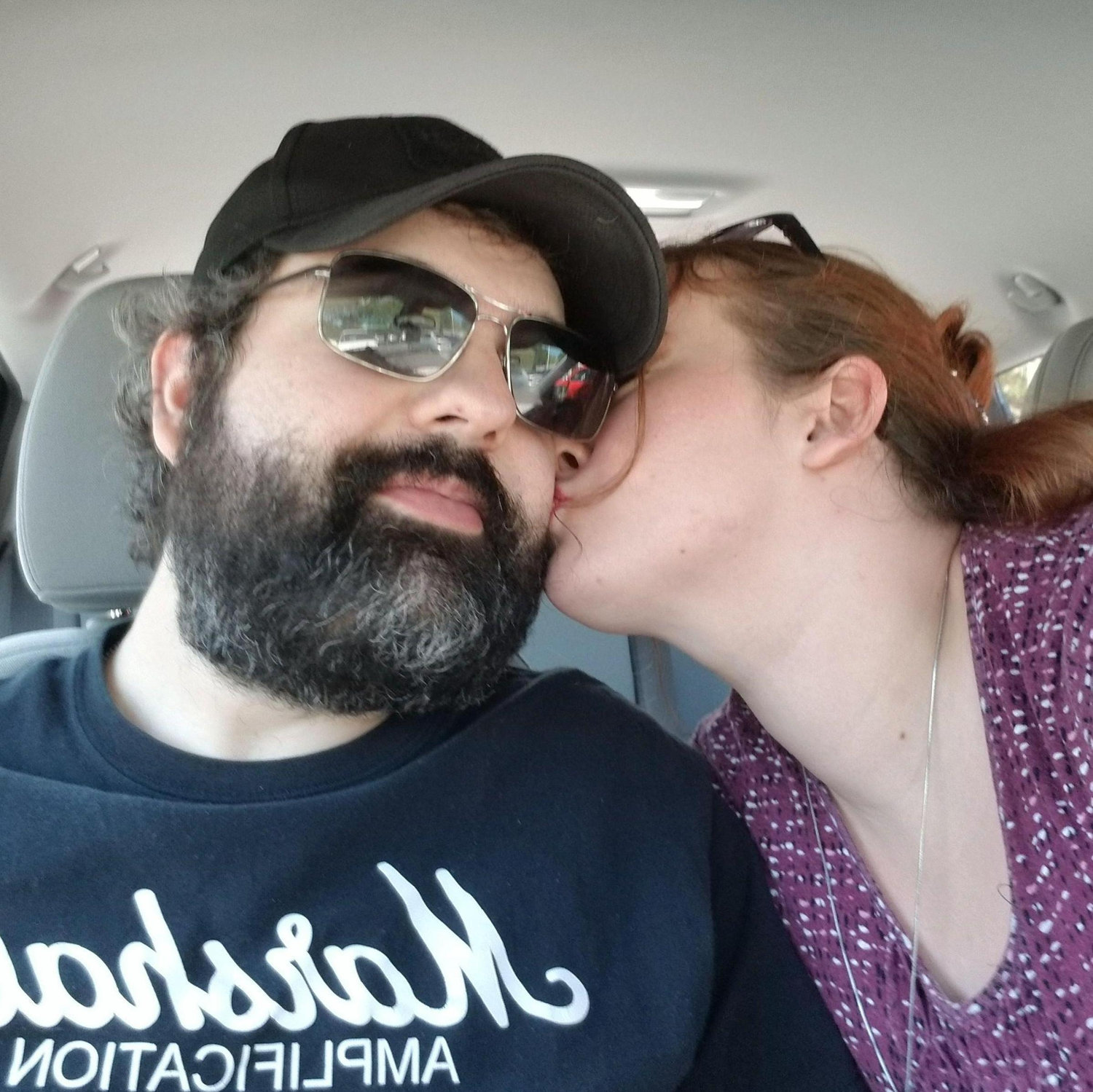 A kiss is the best good luck charm.
