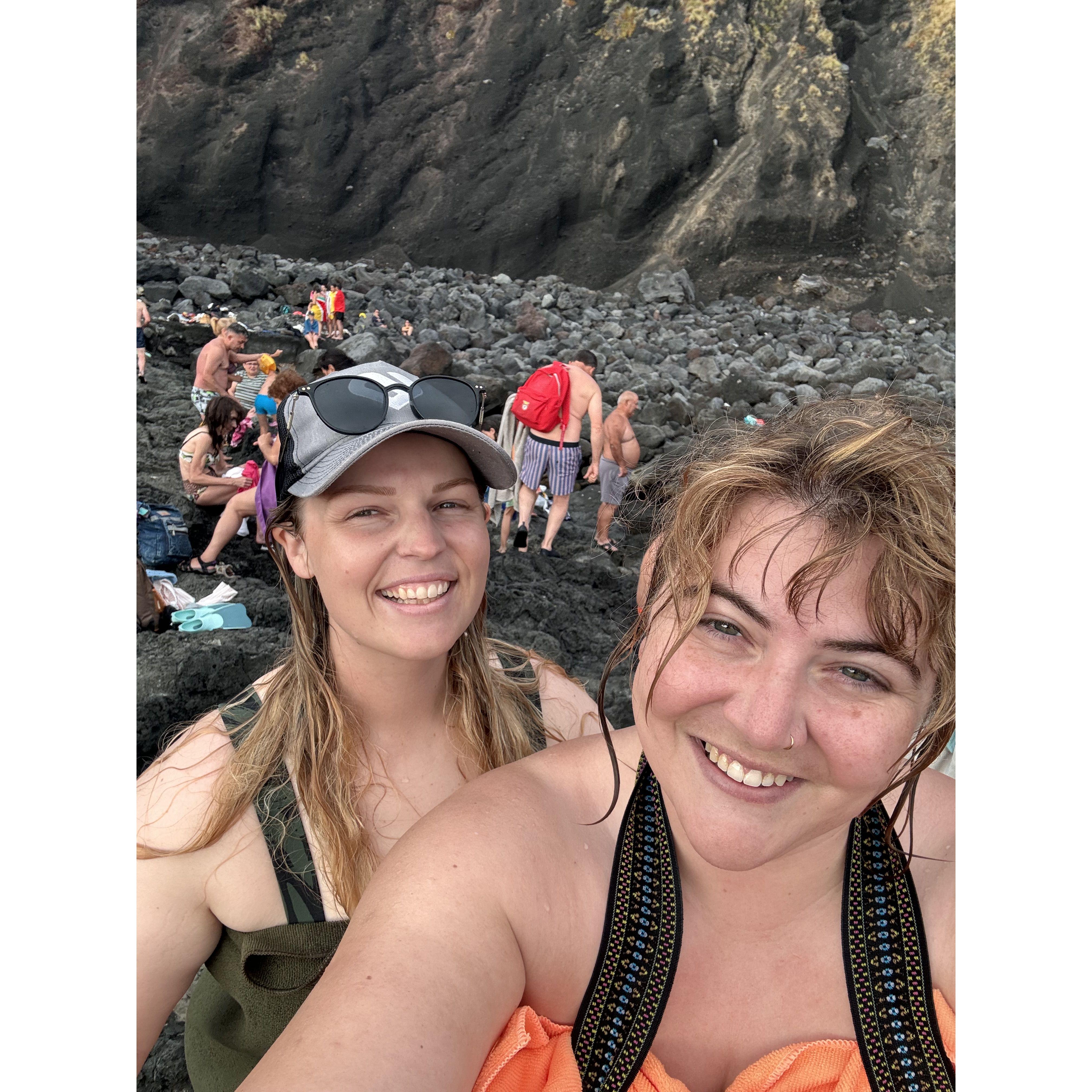 Adventuring down to the natural pool where the ocean meets volcanic hot springs on the coast of Saó Miguel