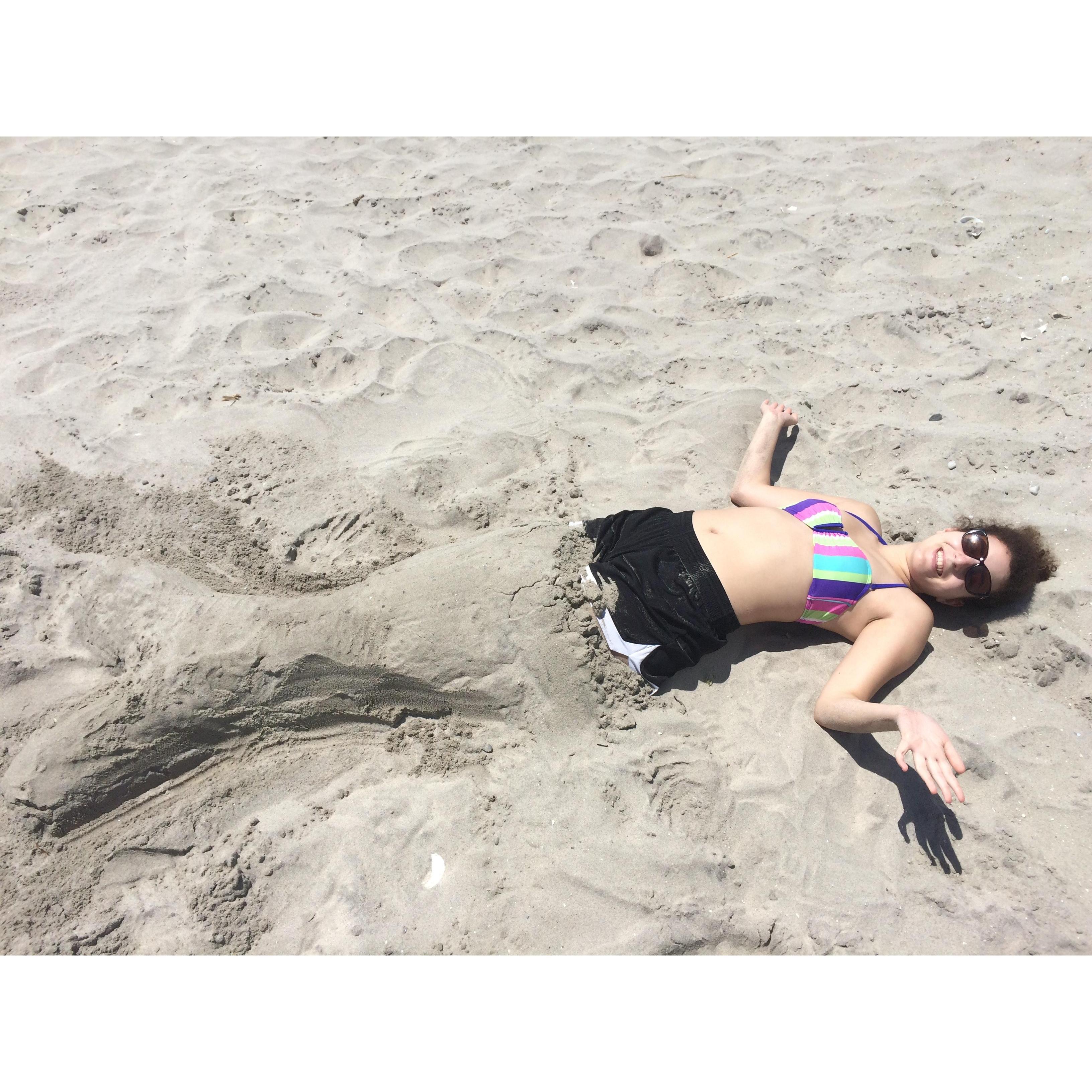 Will made Ash a beautiful sand mermaid! They had a fin-tastic time at the beach!
