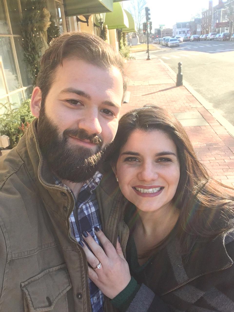 This is us in front of the Hawthorne Hotel the day we said yes to the venue!
