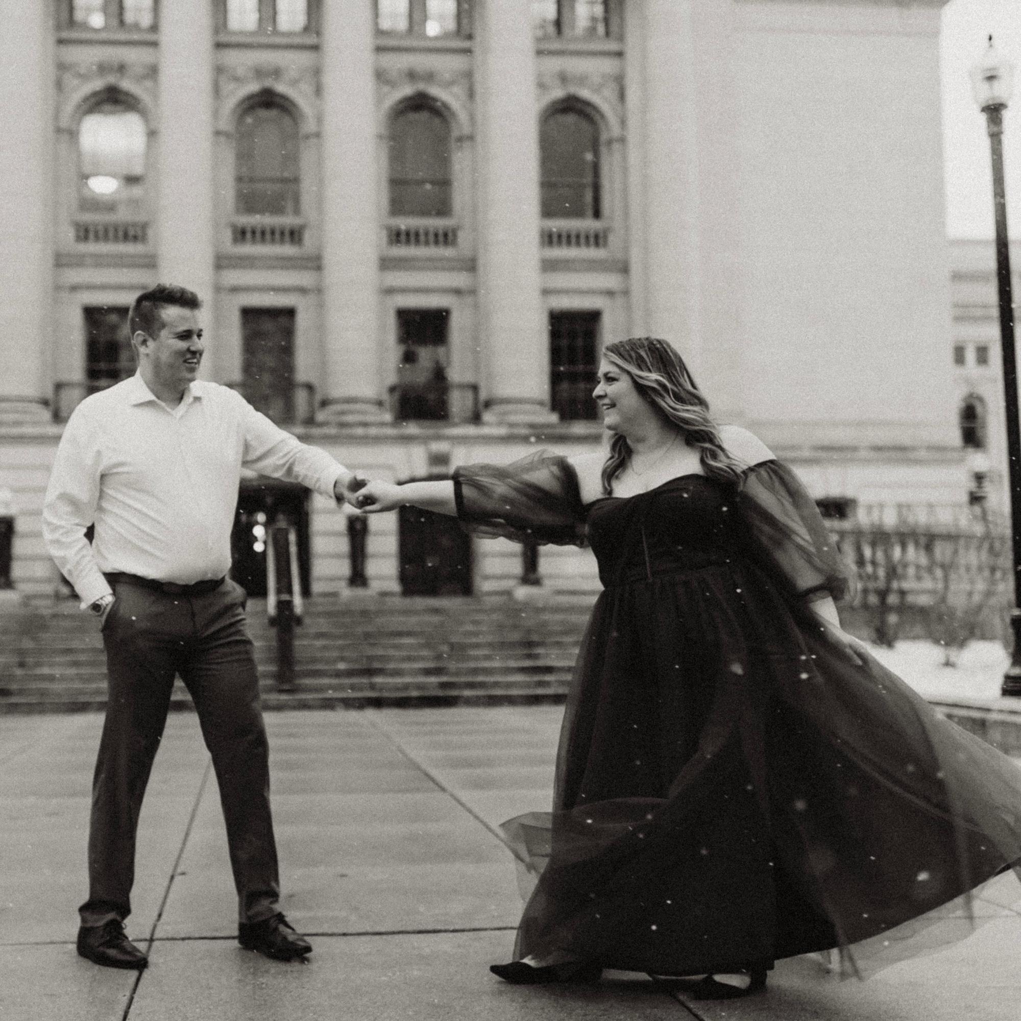 Dancing in front of the Madison Capitol during a snowfall 
February 2024