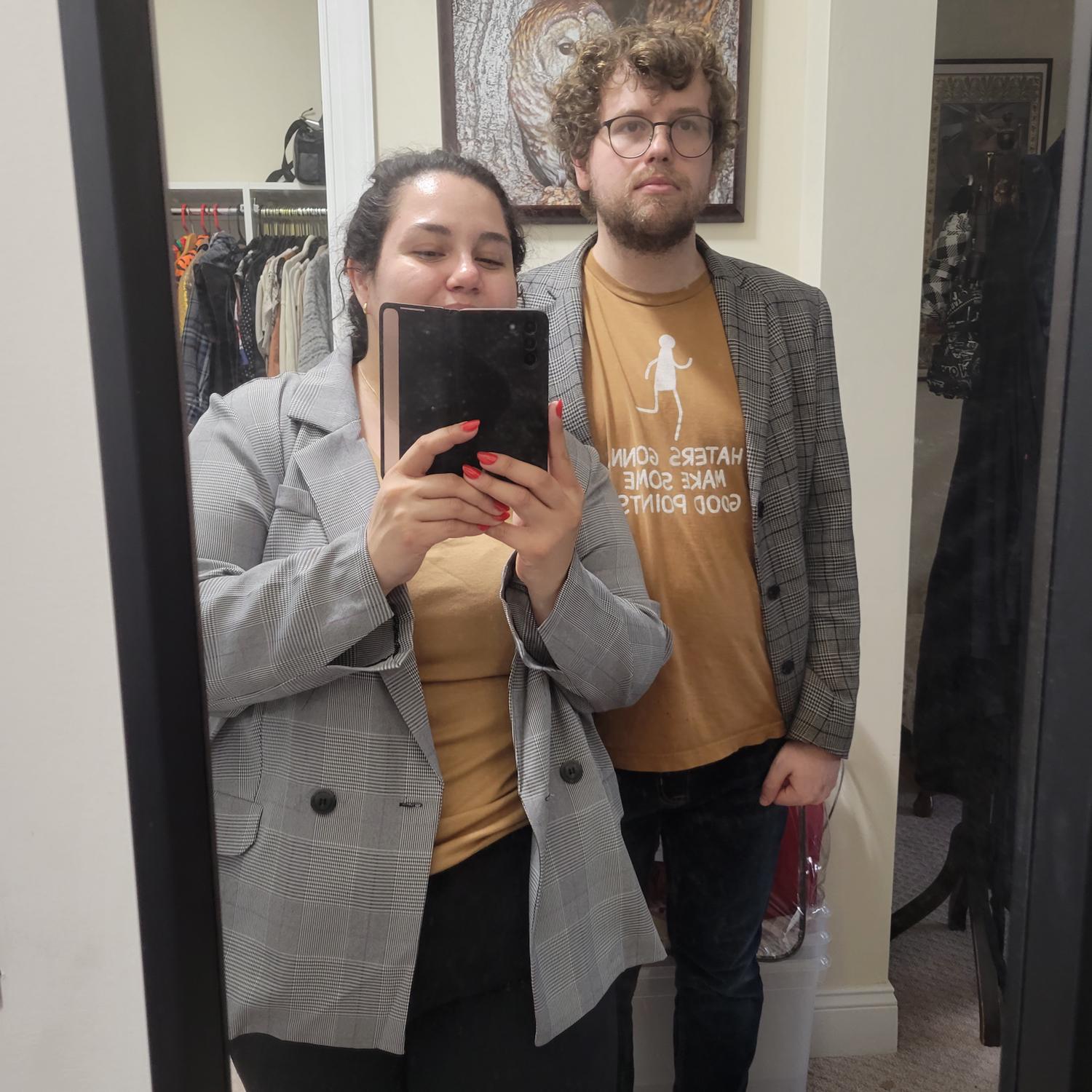 Ang got this blazer from a Macy's Backstage, then made Brian change his outfit so she could take this photo of her pretending to be him.