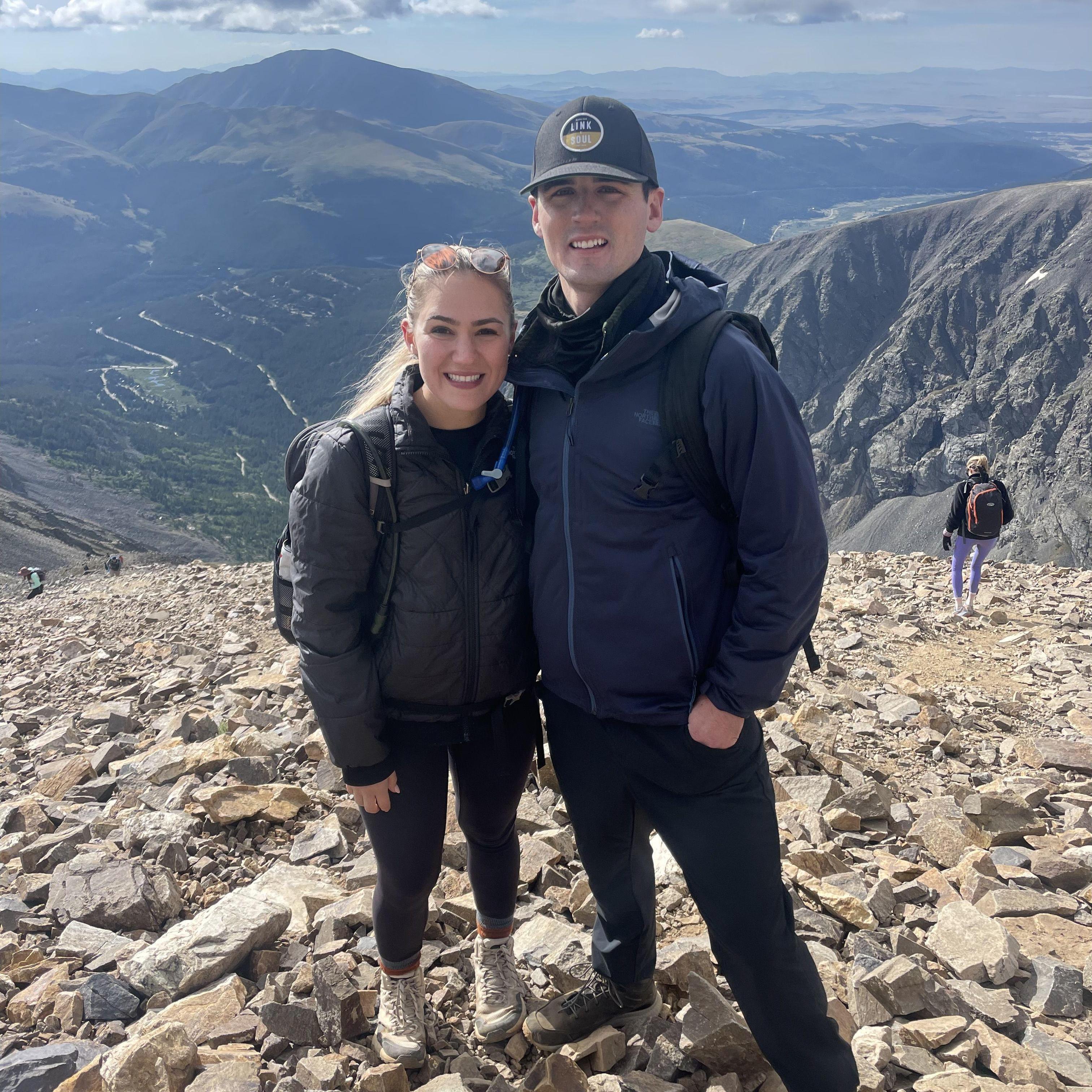 Julie + Matt spent many of their weekends in the summer hiking 14ers (14,000’+ mountains) in Colorado!