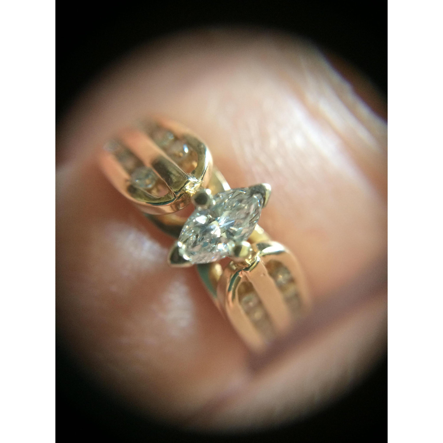 The mother-of-the-bride's first ring! The something old of this wedding!