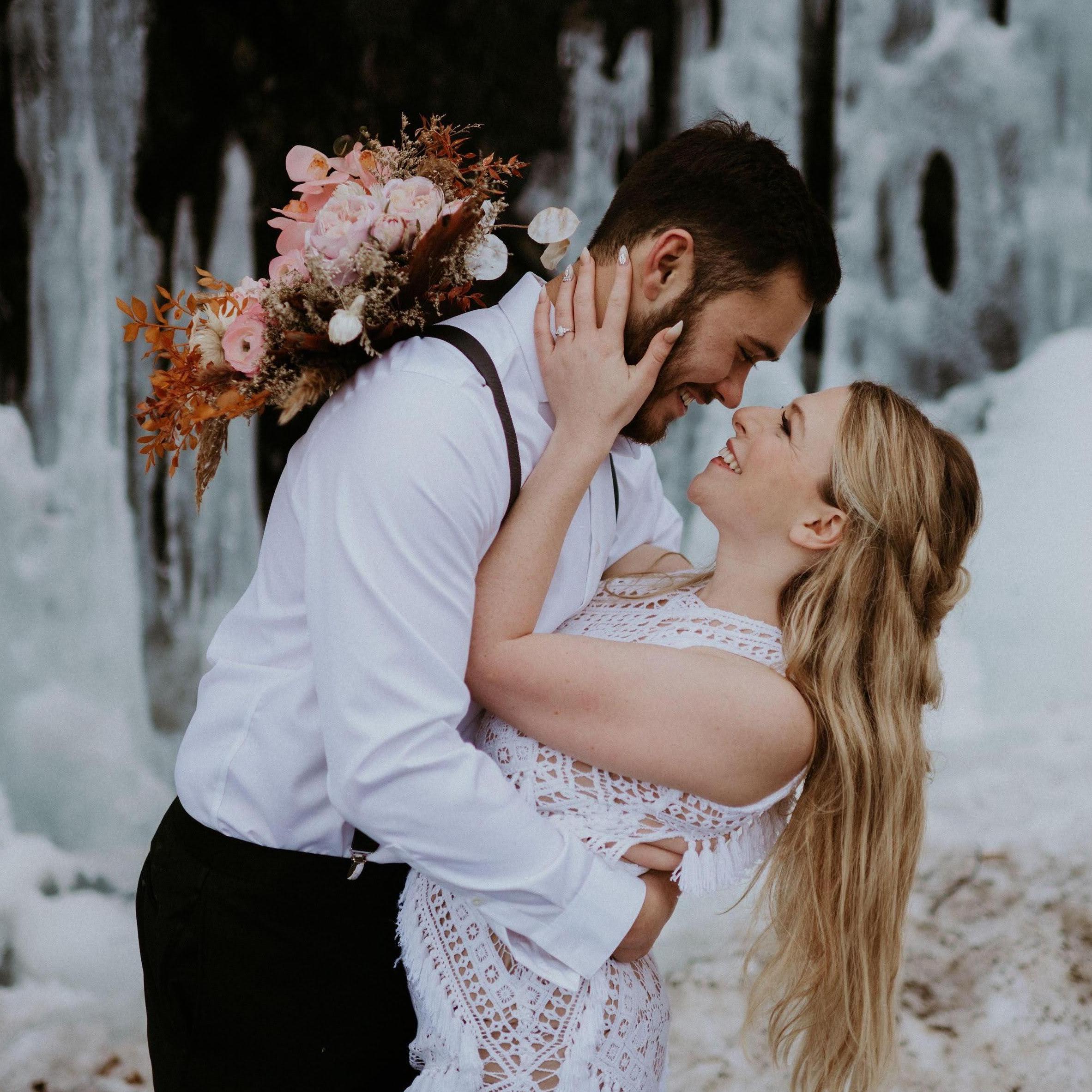 Bridal portrait from photoshoot on proposal day in front of ice on the side of Roan Mountain. (February 12, 2021)