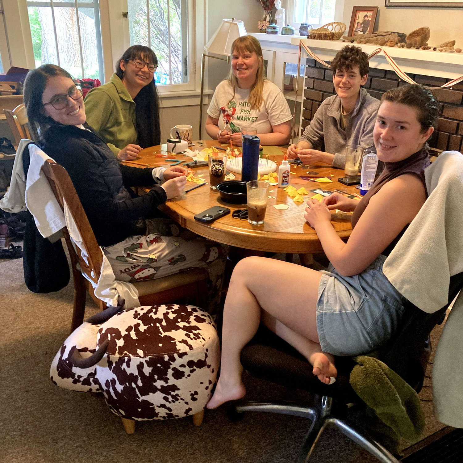Amelia and some friends from college working on decorations