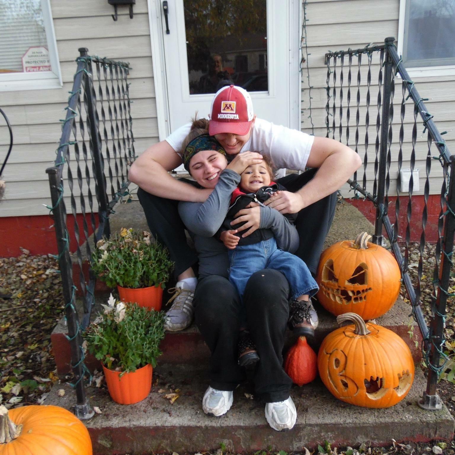Candid moment with the pumpkins we carved together our first Halloween.
