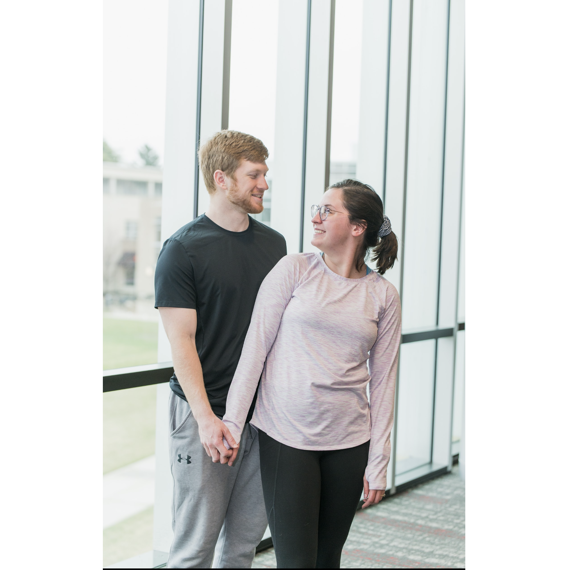 Impromptu engagement pictures in athleisure wear