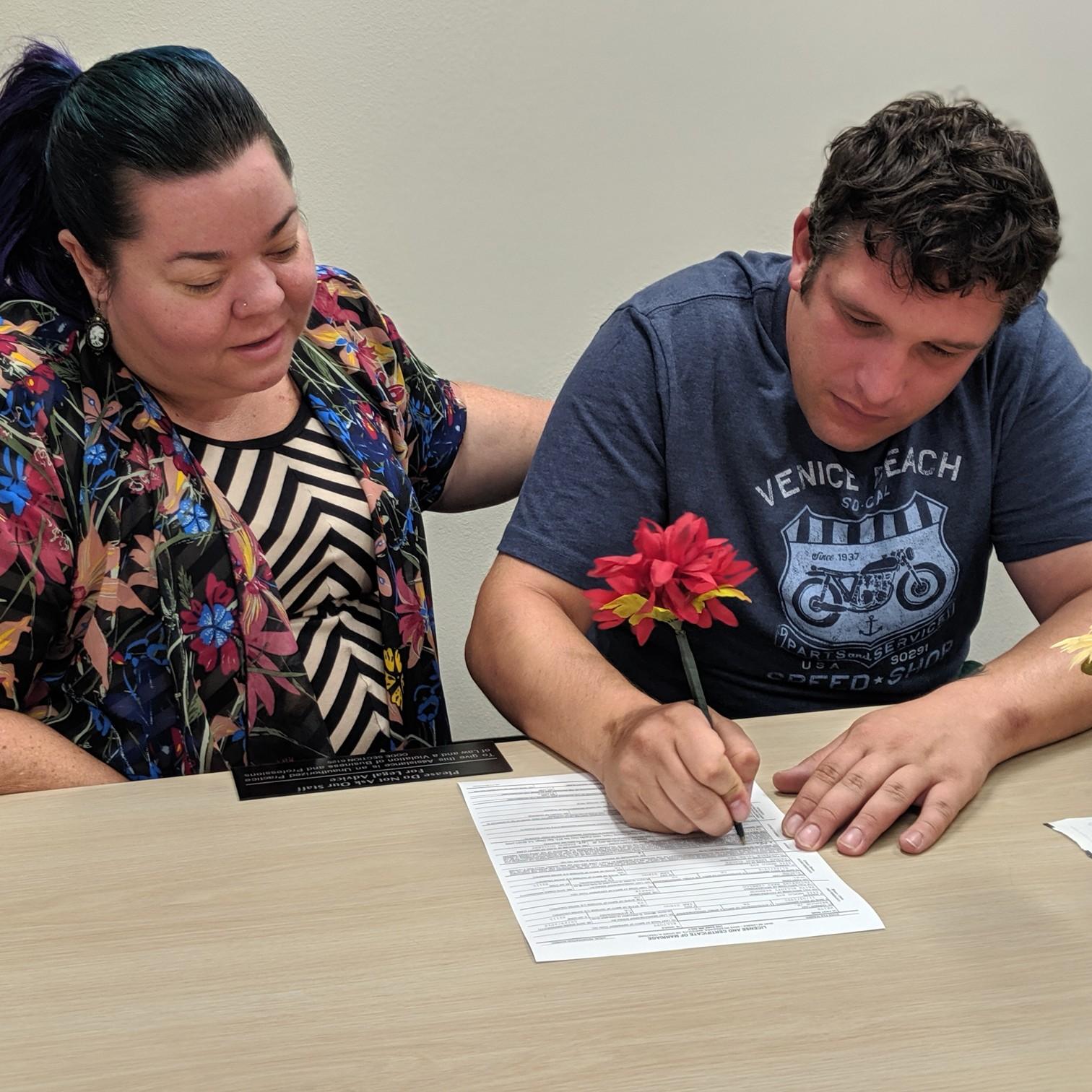 Signing the marriage license