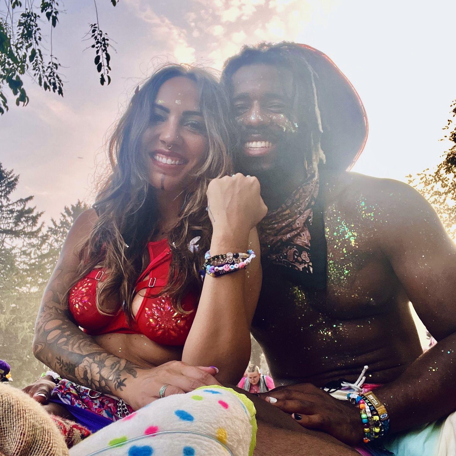 Glittered up and officially a girlfriend! Vernon asked Christina out under a gorgeous tree after they both took a moment to write down their intentions for the festival in their journals.