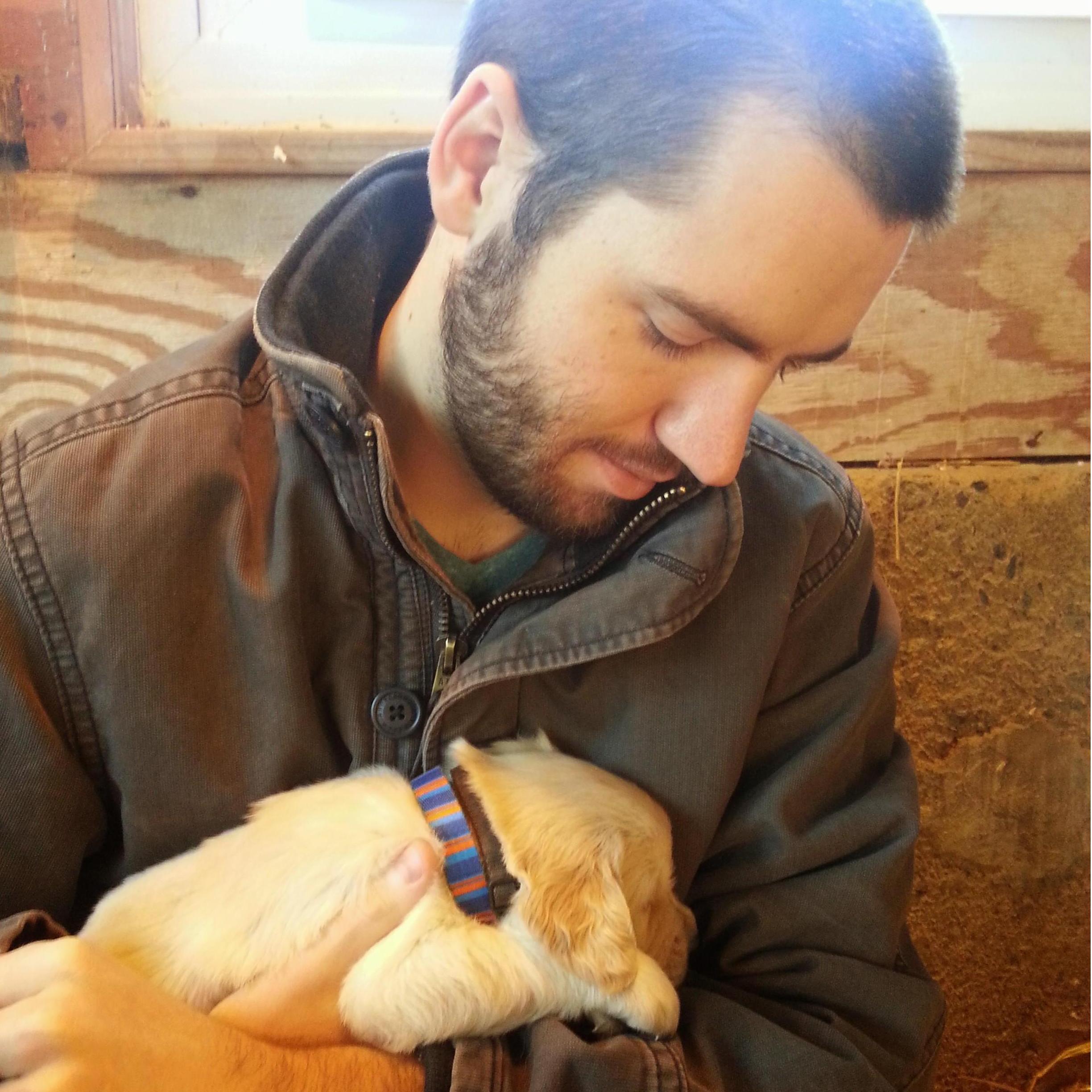 Tom holding Milo for the first time!