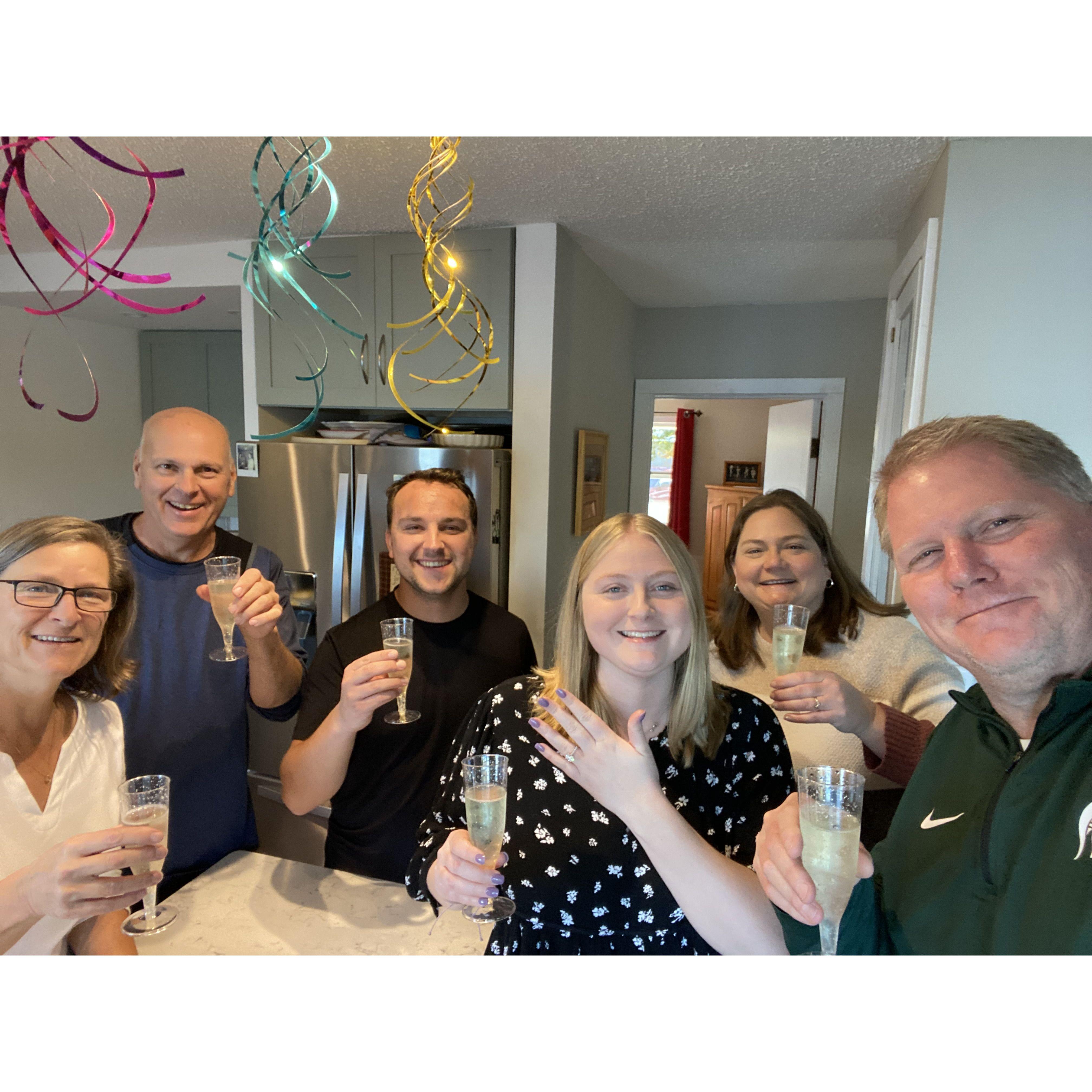 Celebrating with family after she said yes!