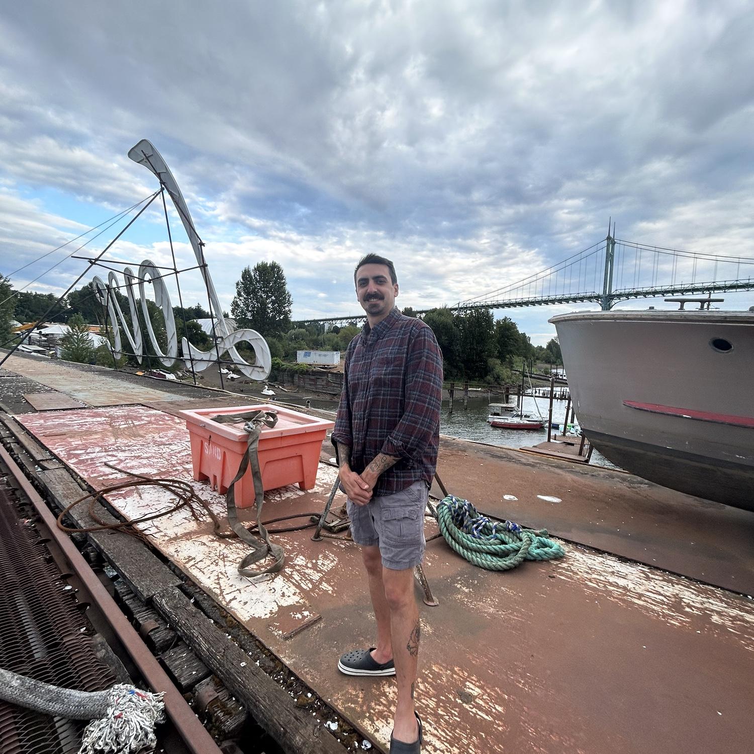 Exploring Saint John’s PDX together. They snuck behind the LOVE sign by Cathedral Park, and in their engagement photos you can see this sign behind them.