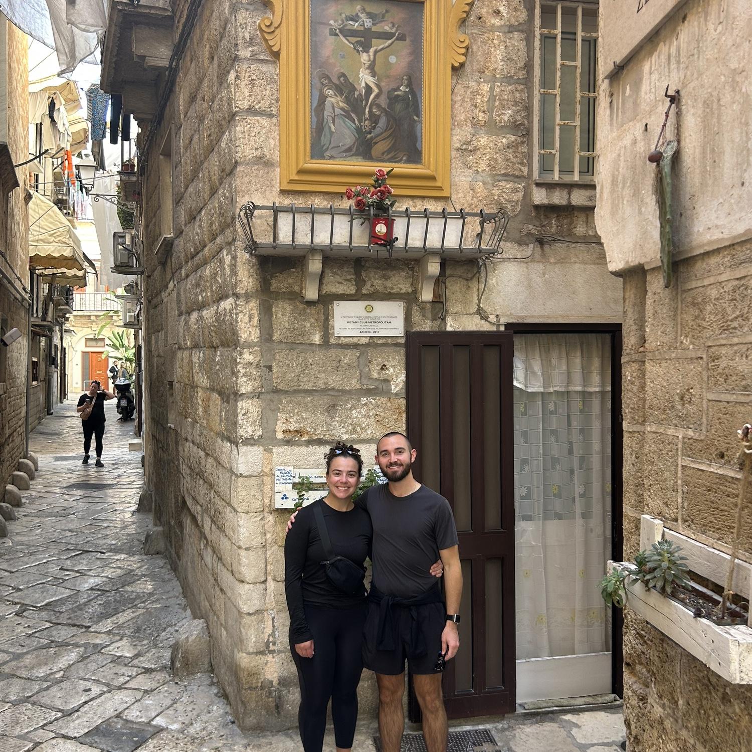 Two lovers in the streets of Bari, Italy