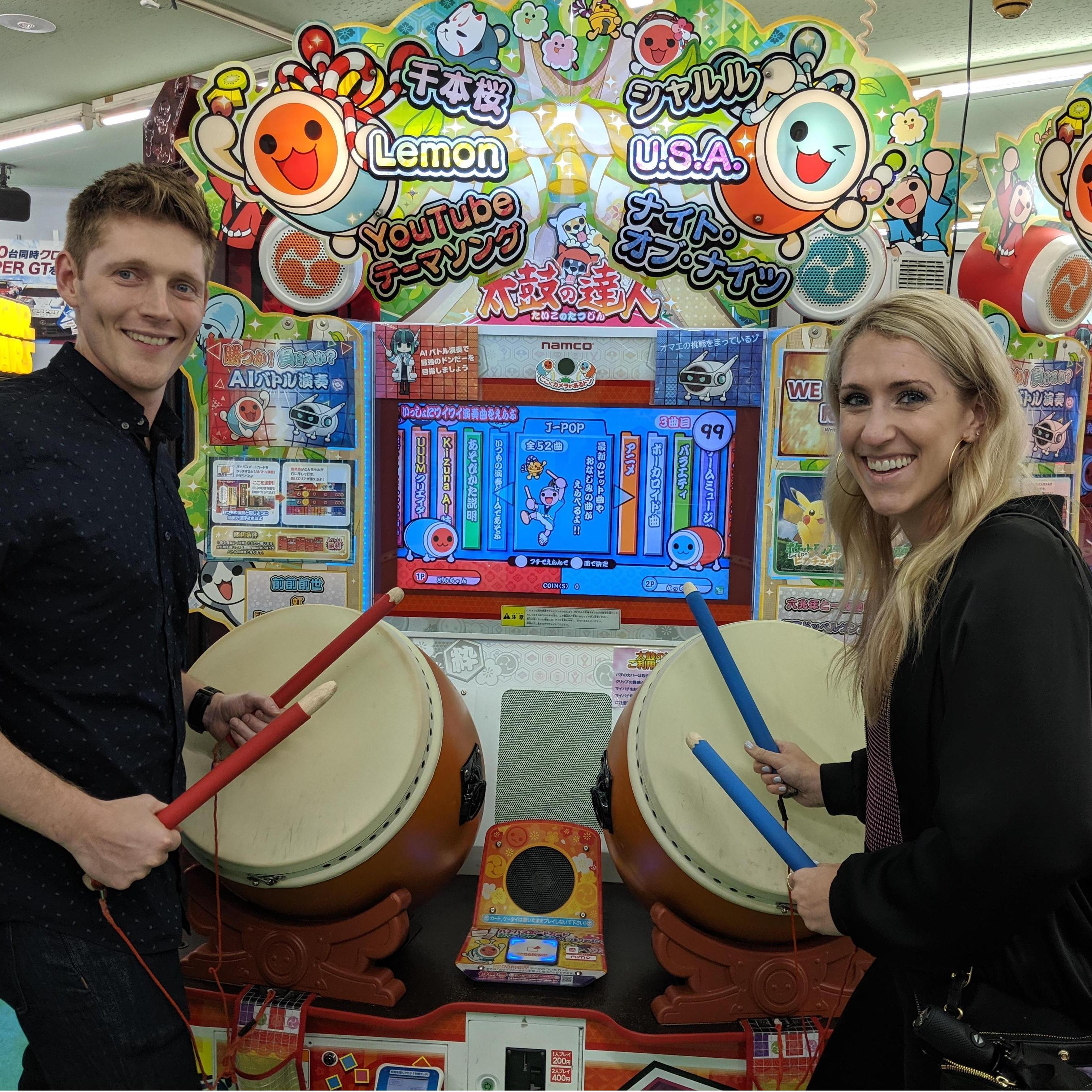 Playing at an arcade in Tokyo
