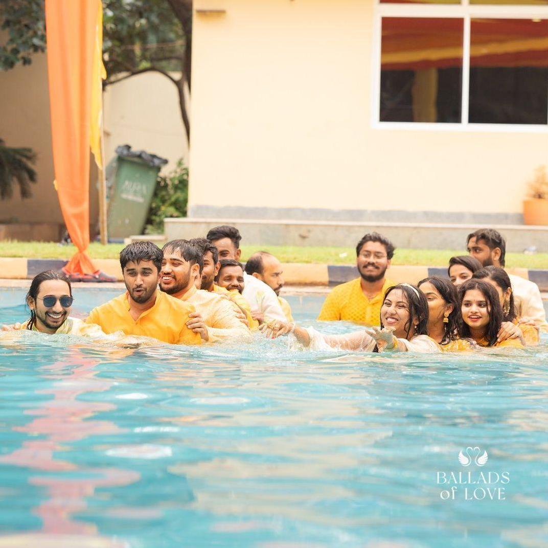 Team Bride vs. Team Groom, poolside rivalry with a splash of fun!