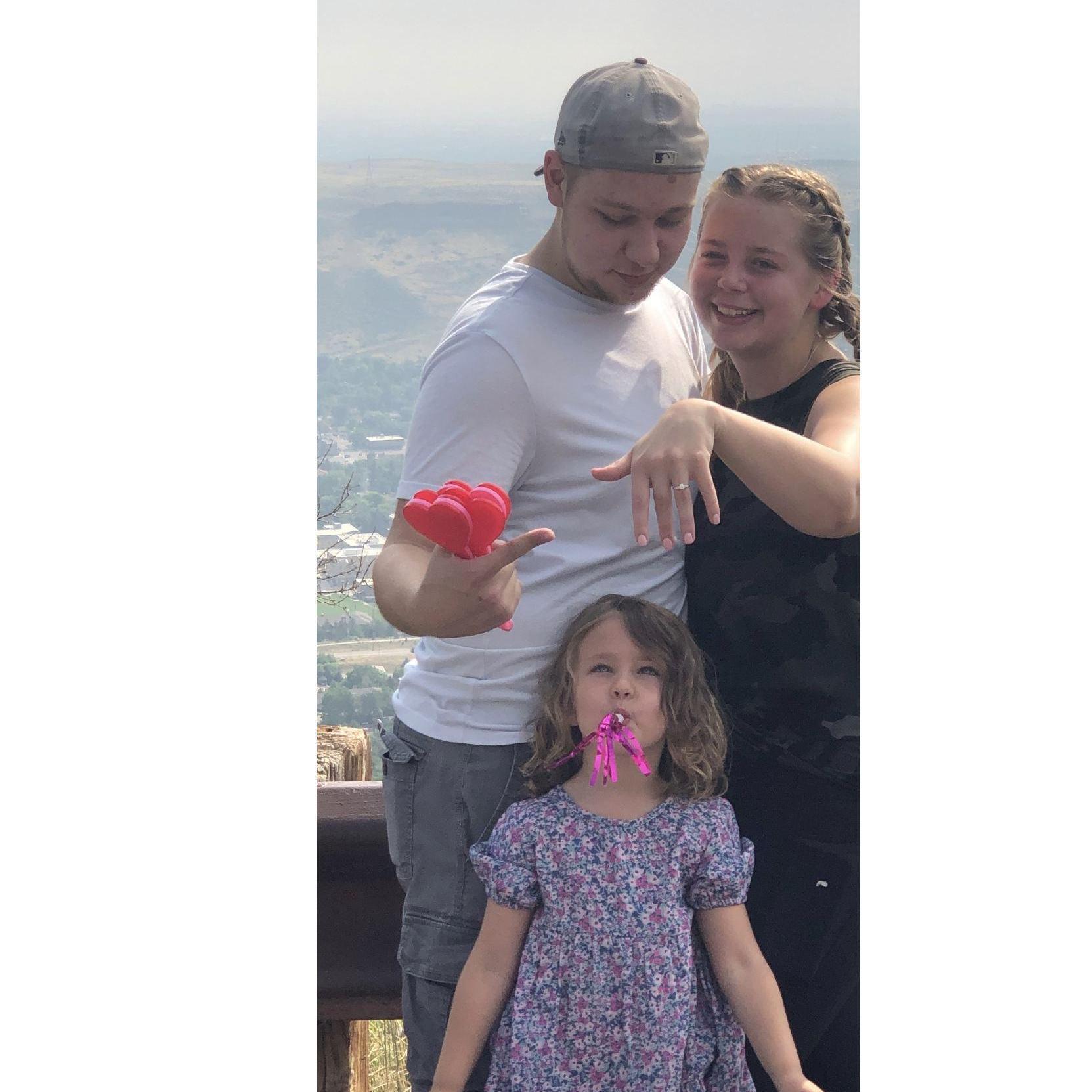 Evelyne helping celebrate the engagement